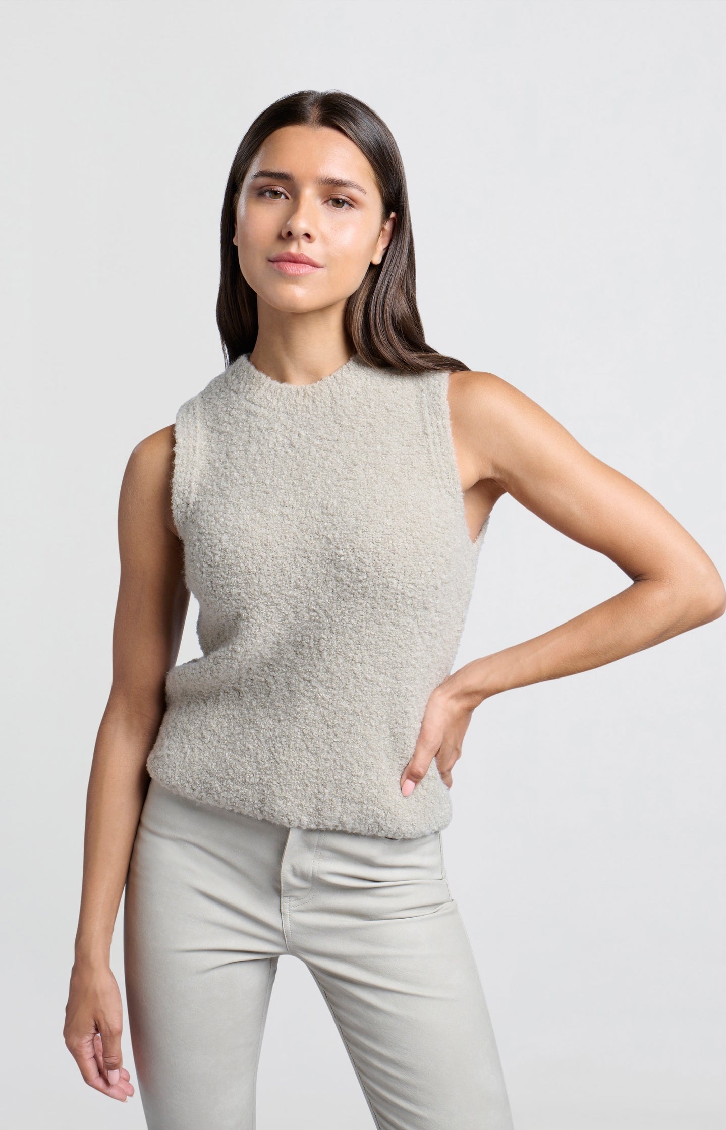 Soft sleeveless sweater with round neck and unique texture