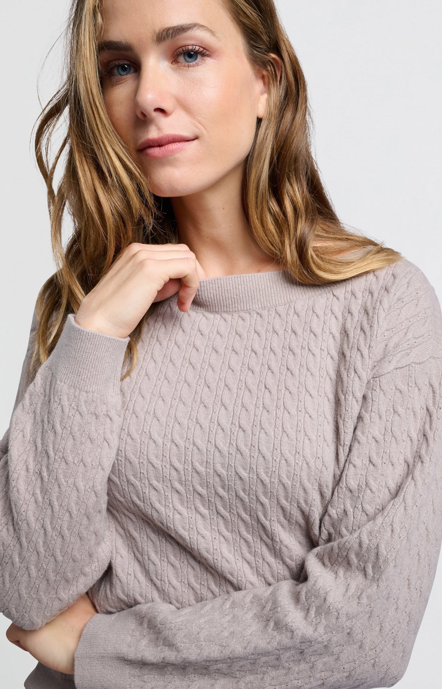 Soft sweater with boat neck, long sleeves and cable detail