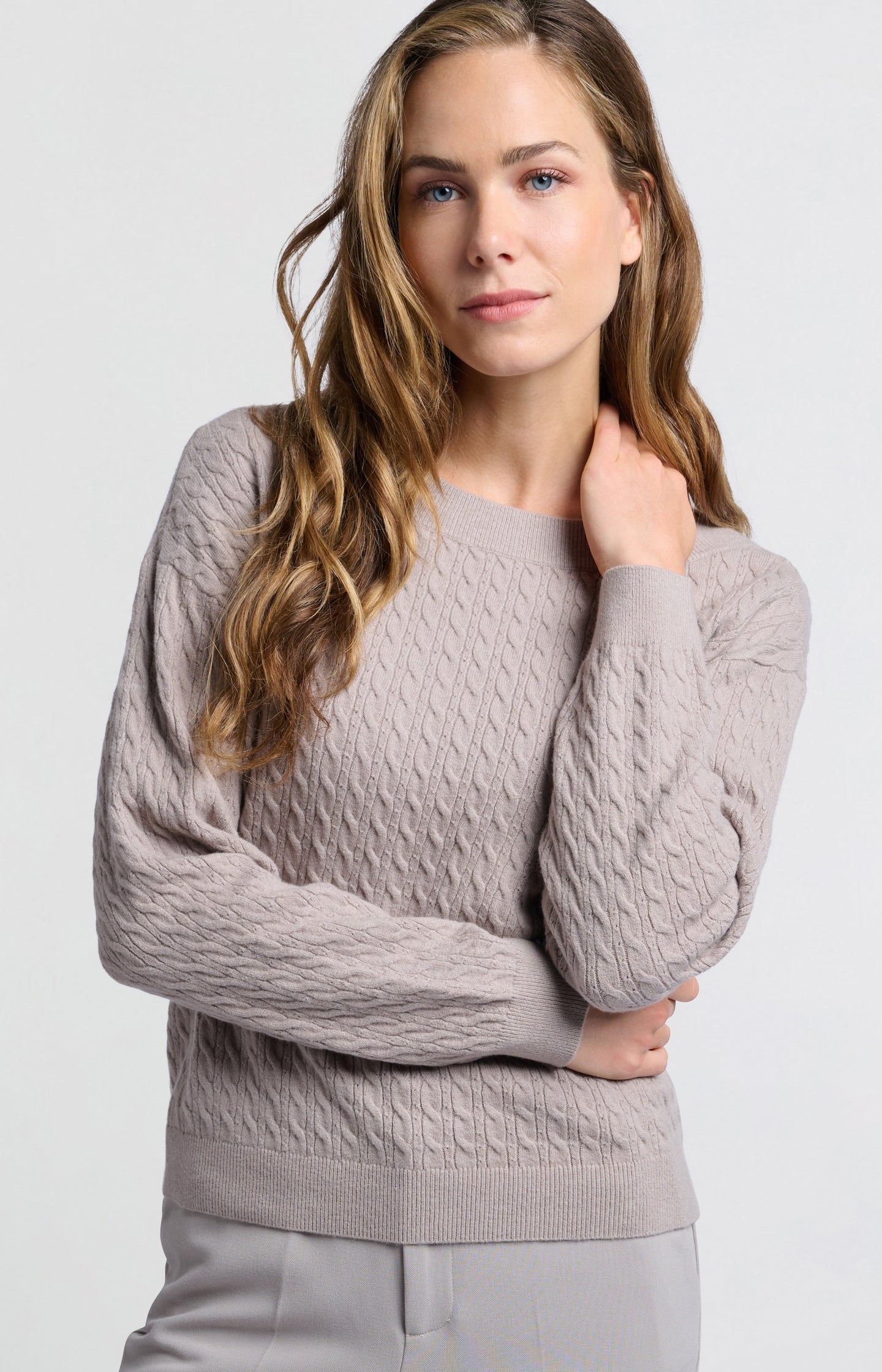 Soft sweater with boat neck, long sleeves and cable detail