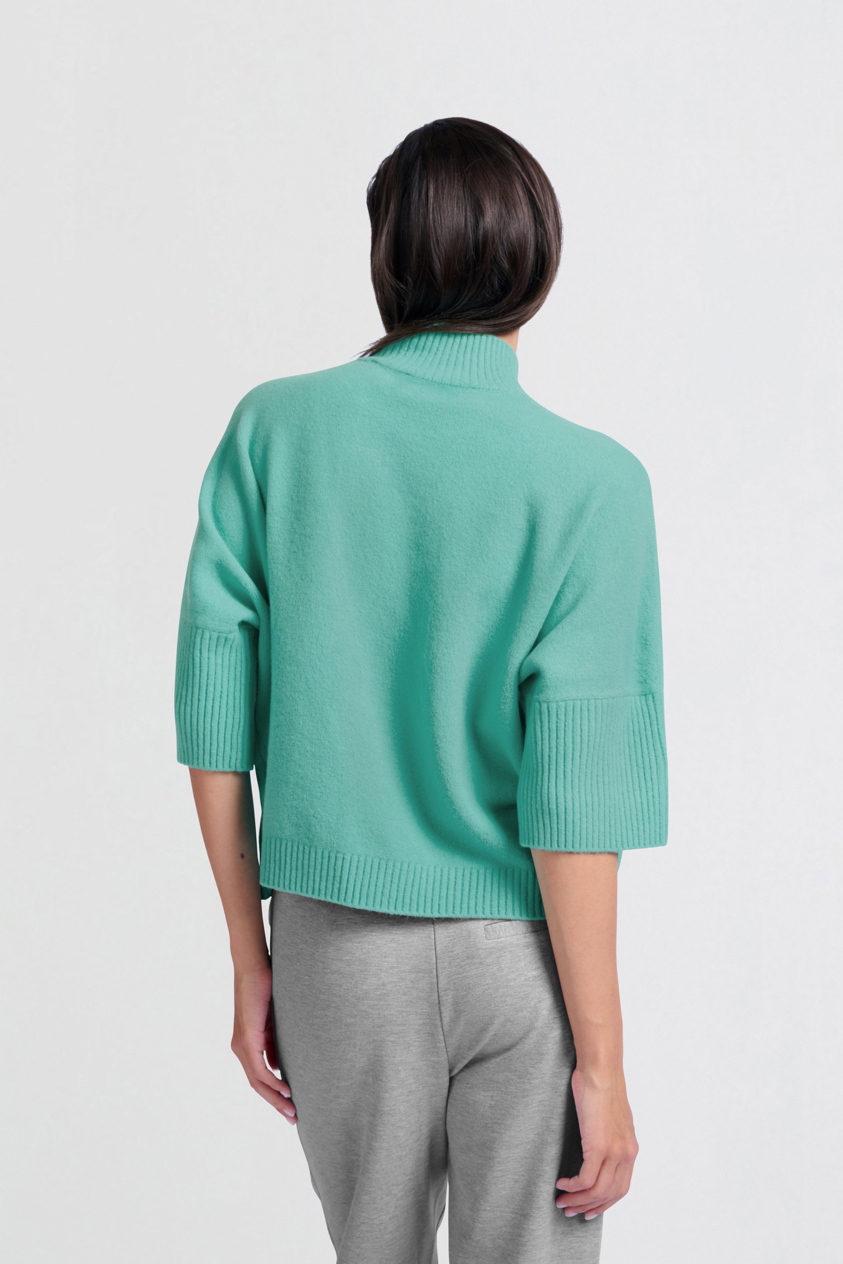 Soft sweater with high neck and three-quarter sleeves