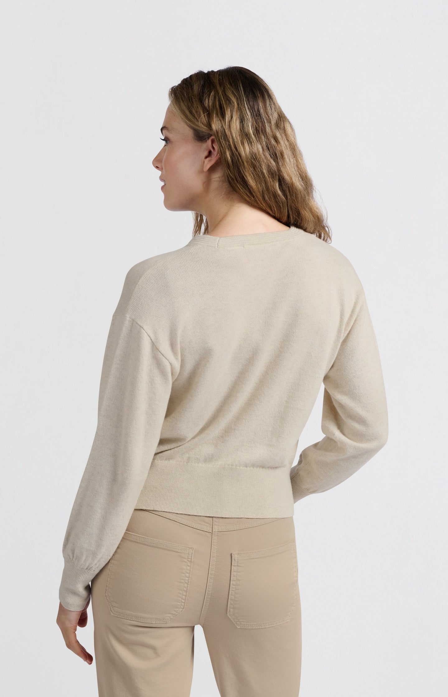 Soft sweater with V-neckline and chest pockets