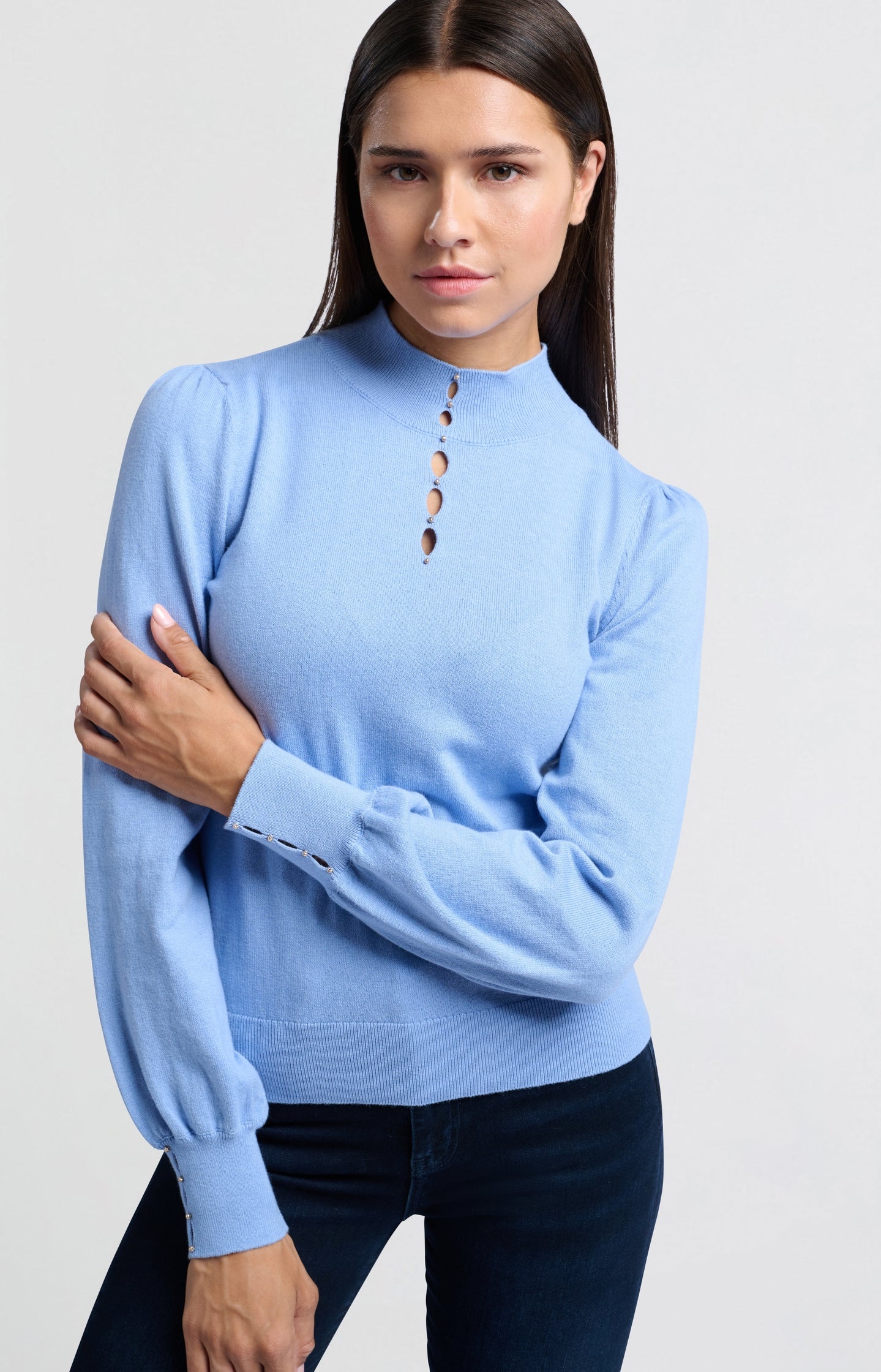 Soft turtleneck with button details and balloon sleeves