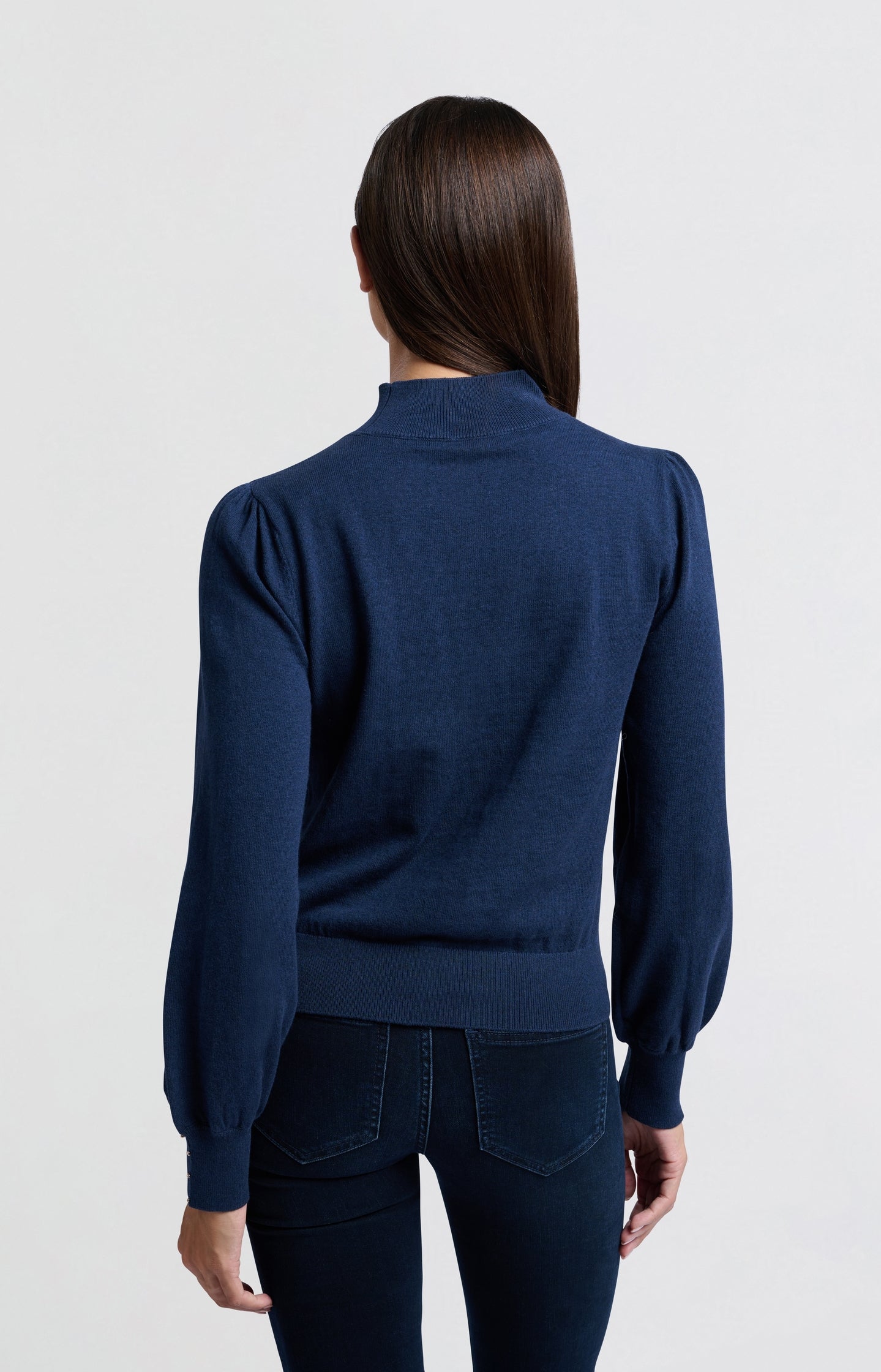 Soft turtleneck with button details and balloon sleeves