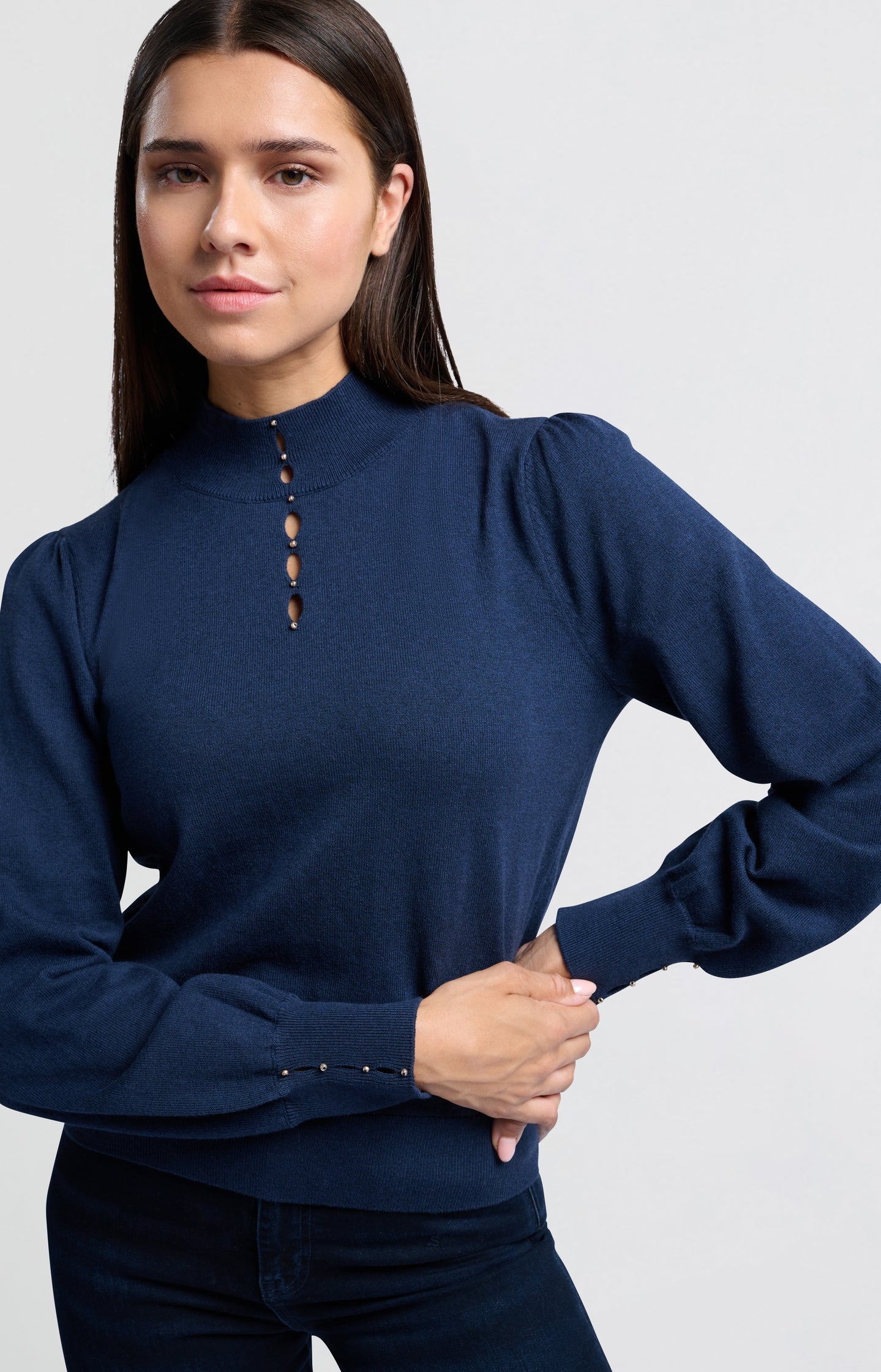 Soft turtleneck with button details and balloon sleeves