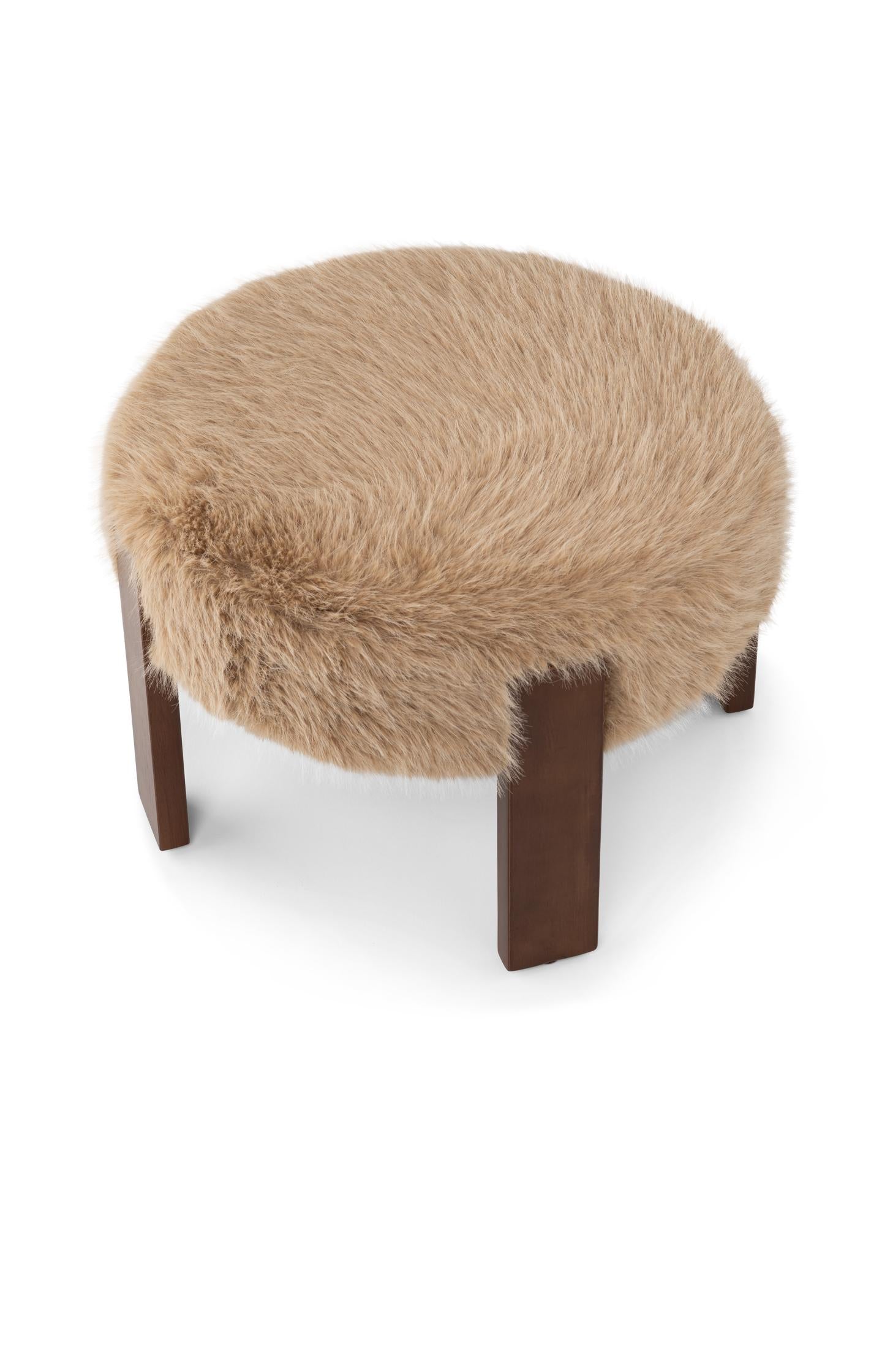 Stool with wooden legs and soft seat