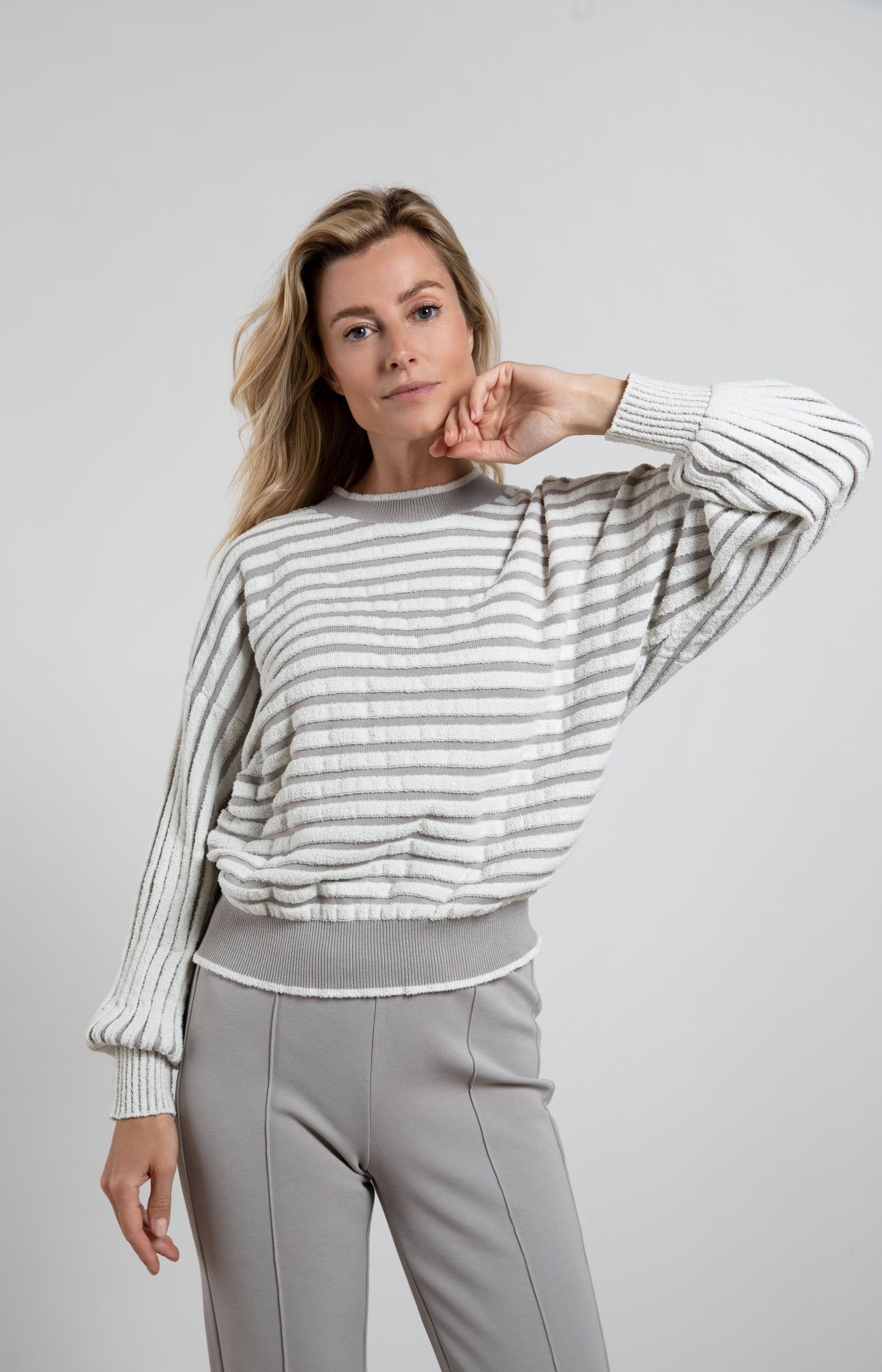 Striped sweater with crewneck, long sleeves and frayed seams