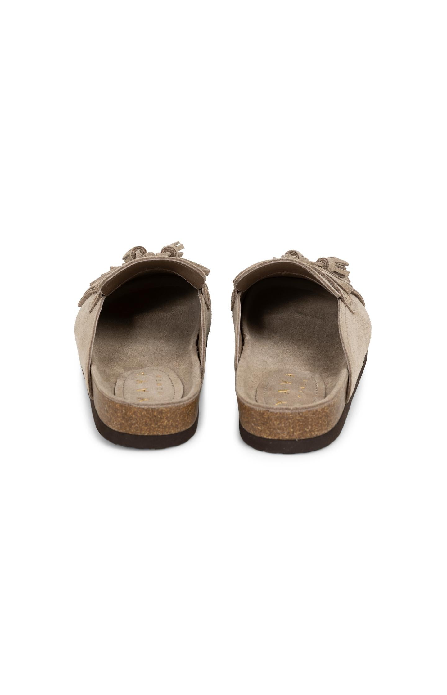 Suede mules with tassels