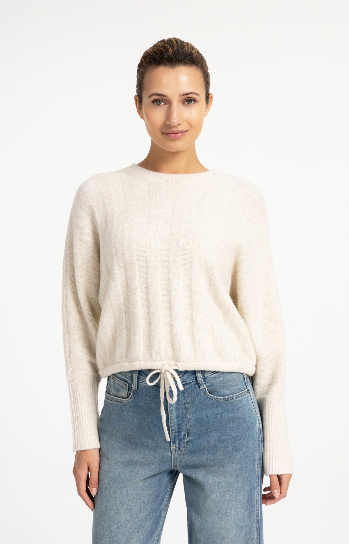 Sweater with batwing sleeves and drawcord at the hem