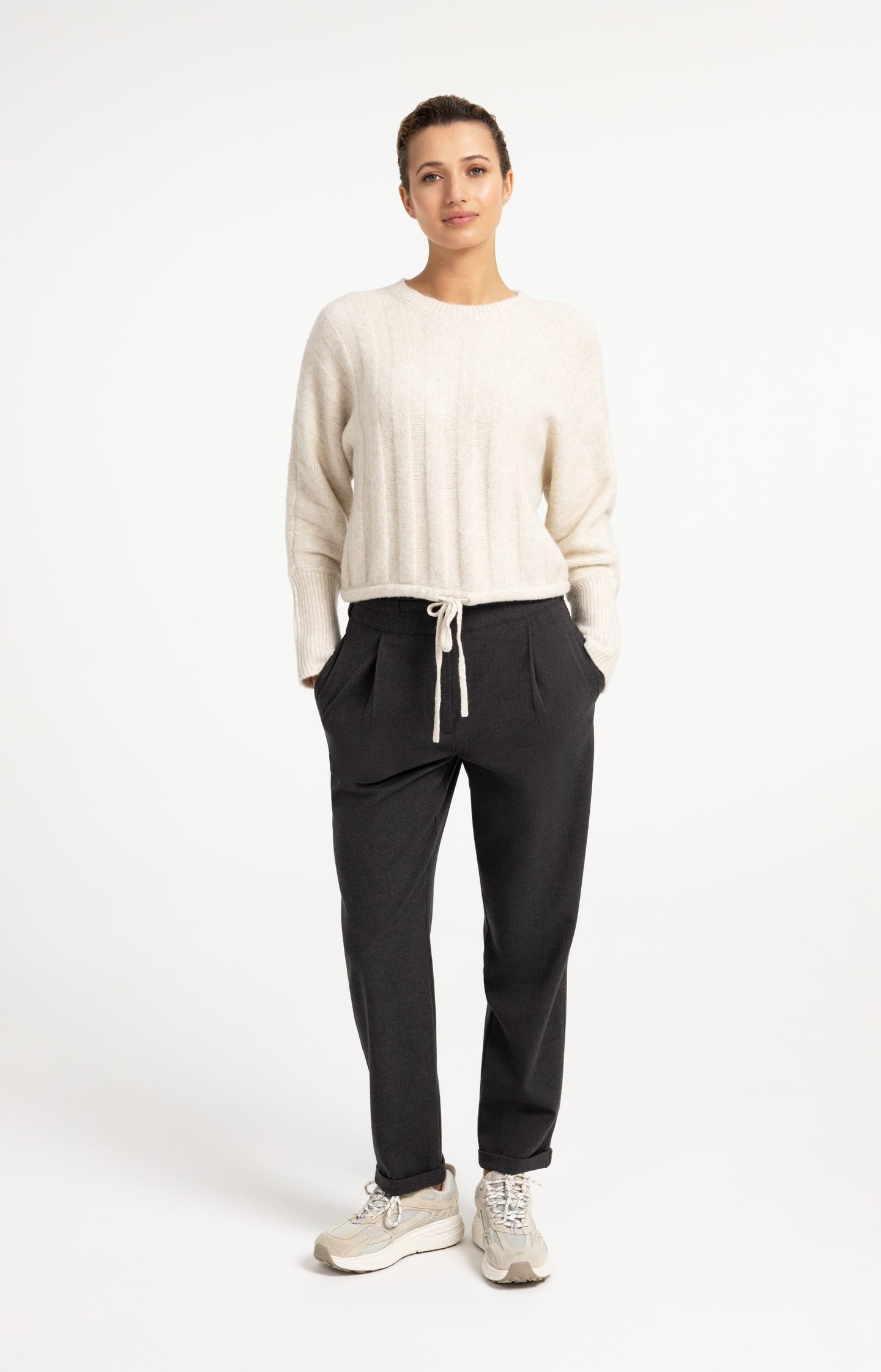 Sweater with batwing sleeves and drawcord at the hem