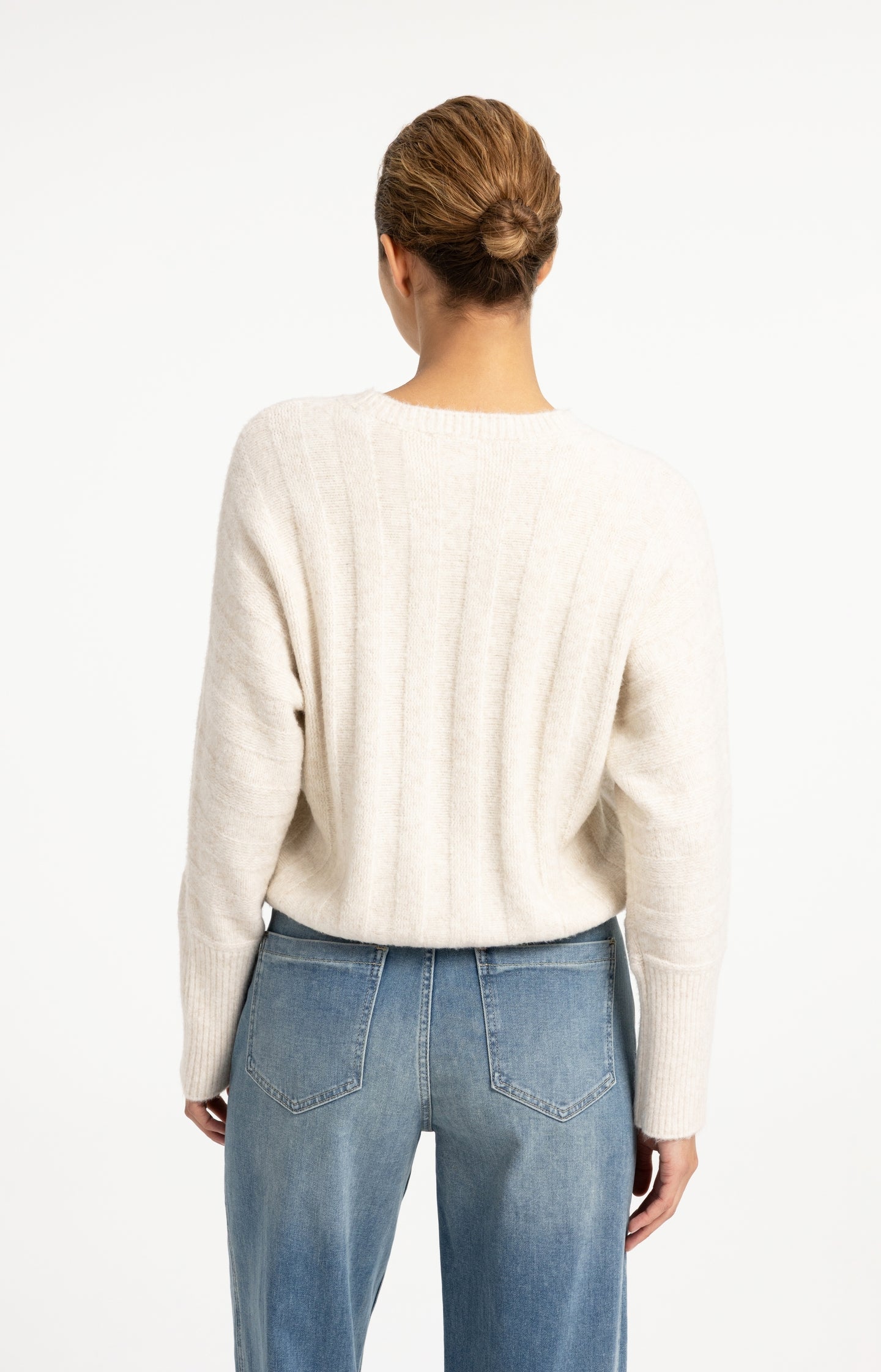 Sweater with batwing sleeves and drawcord at the hem