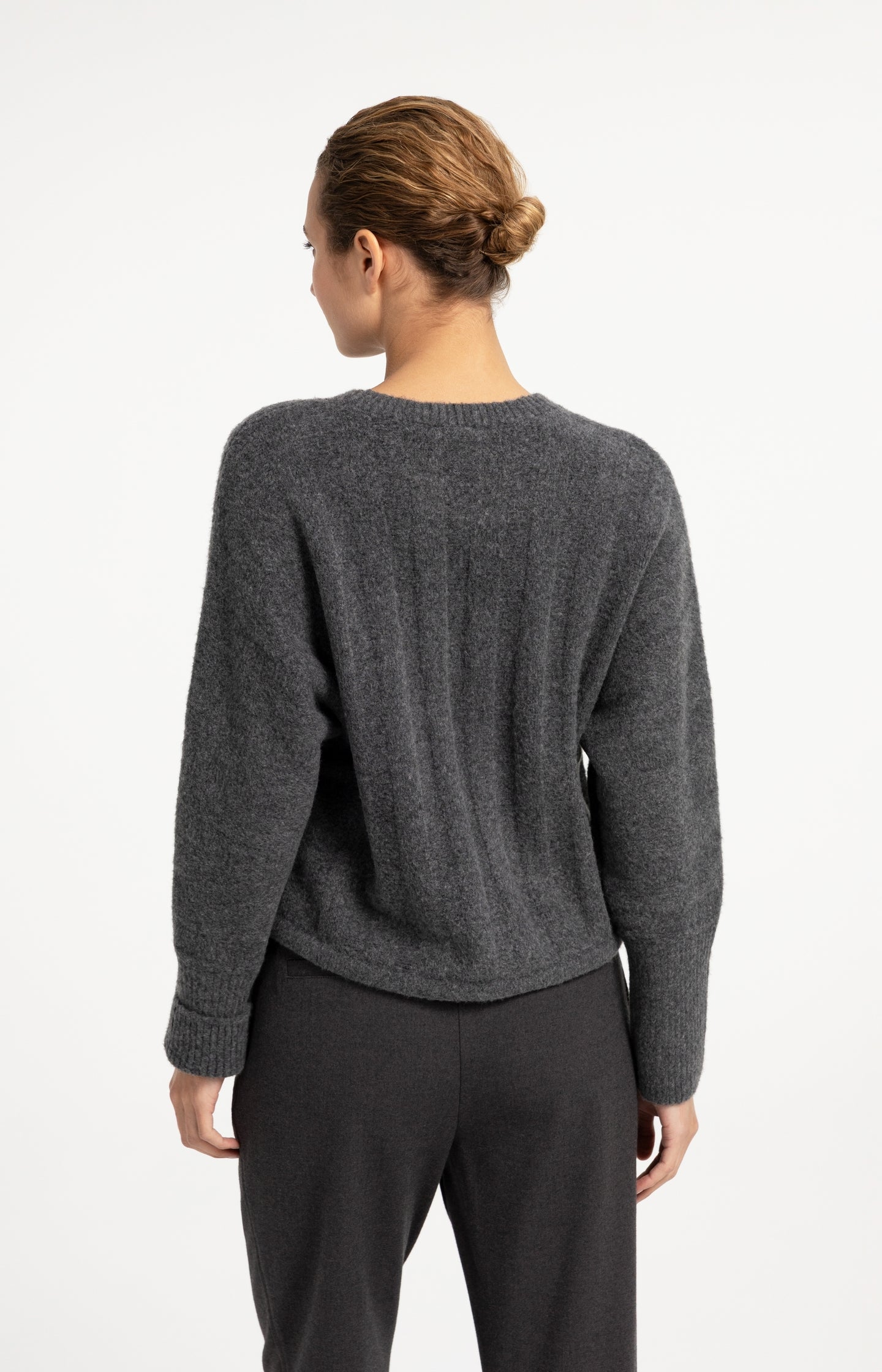 Sweater with batwing sleeves and drawcord at the hem