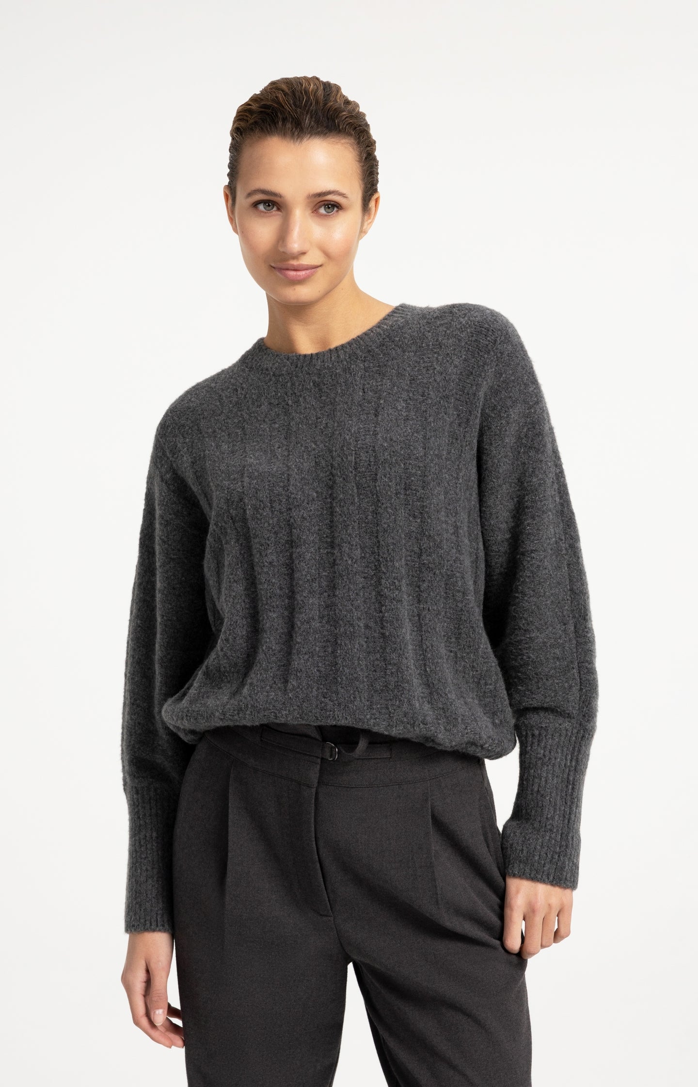 Sweater with batwing sleeves and drawcord at the hem