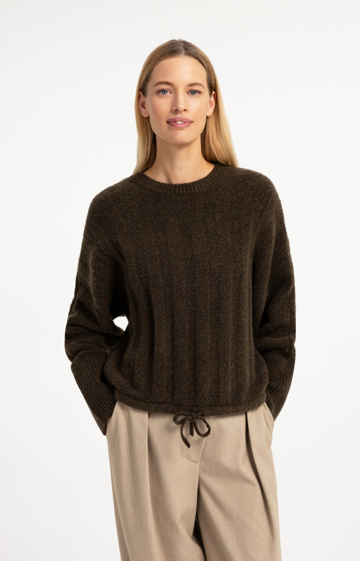 Sweater with batwing sleeves and drawcord at the hem