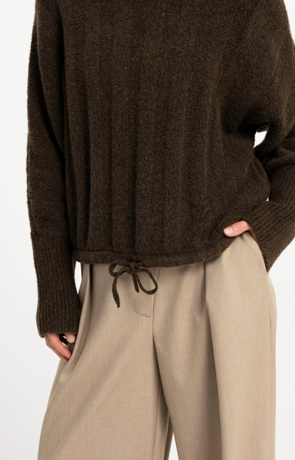 Sweater with batwing sleeves and drawcord at the hem