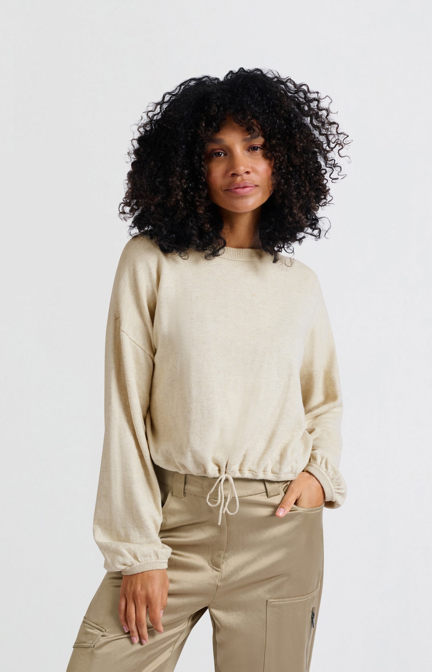 Sweater with corded hem and loose fit