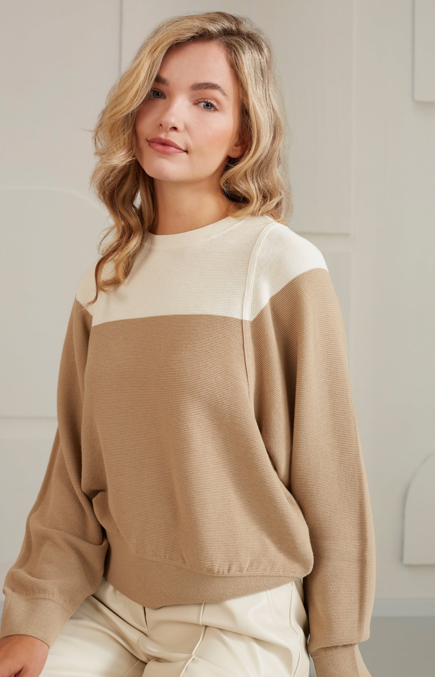 Sweater with crewneck, long sleeves and stich details