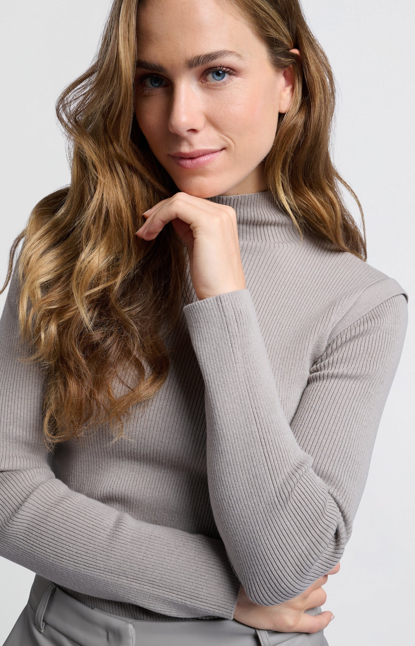 Sweater with high neck and long sleeves in ribbed fabric