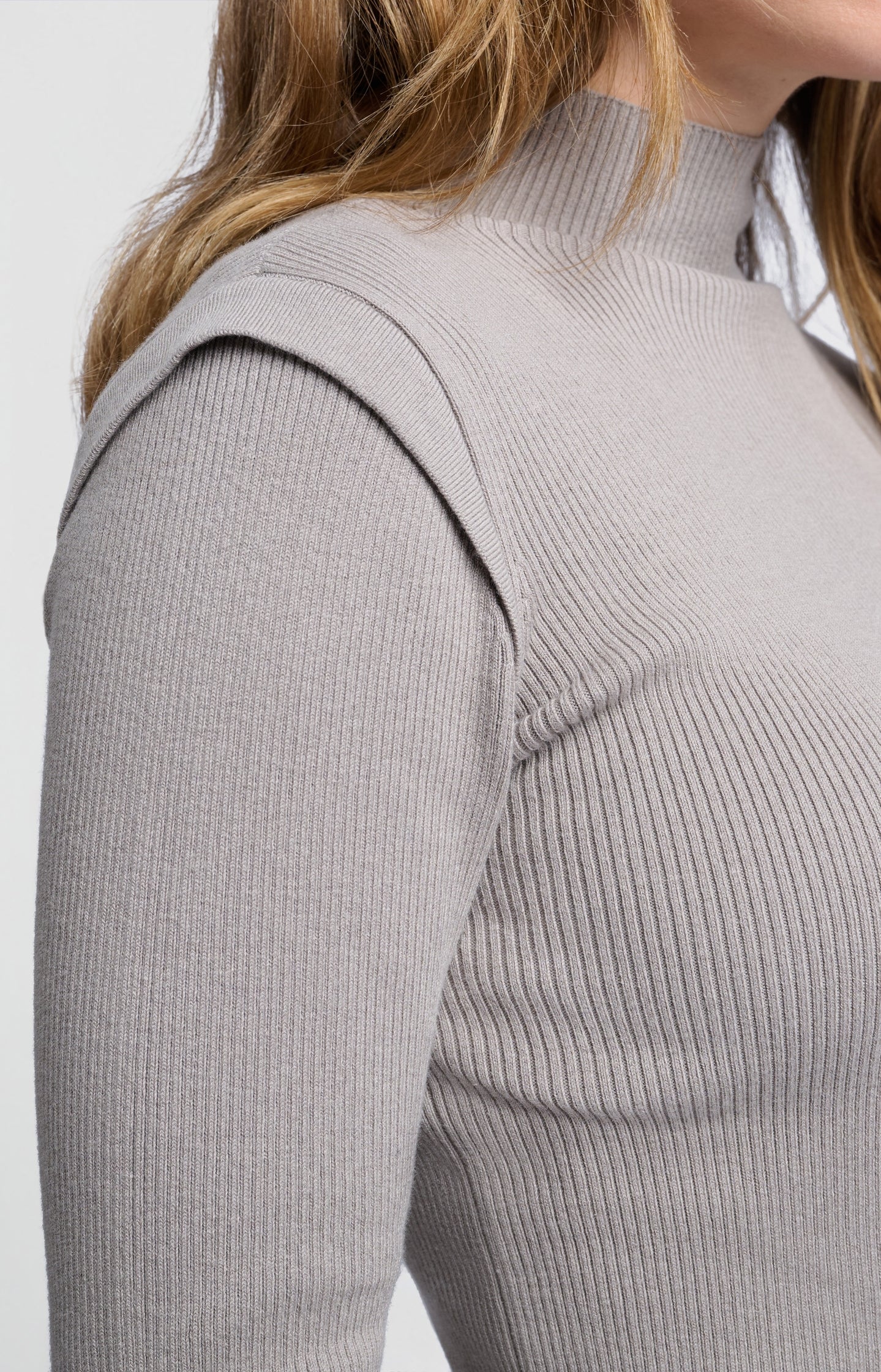 Sweater with high neck and long sleeves in ribbed fabric