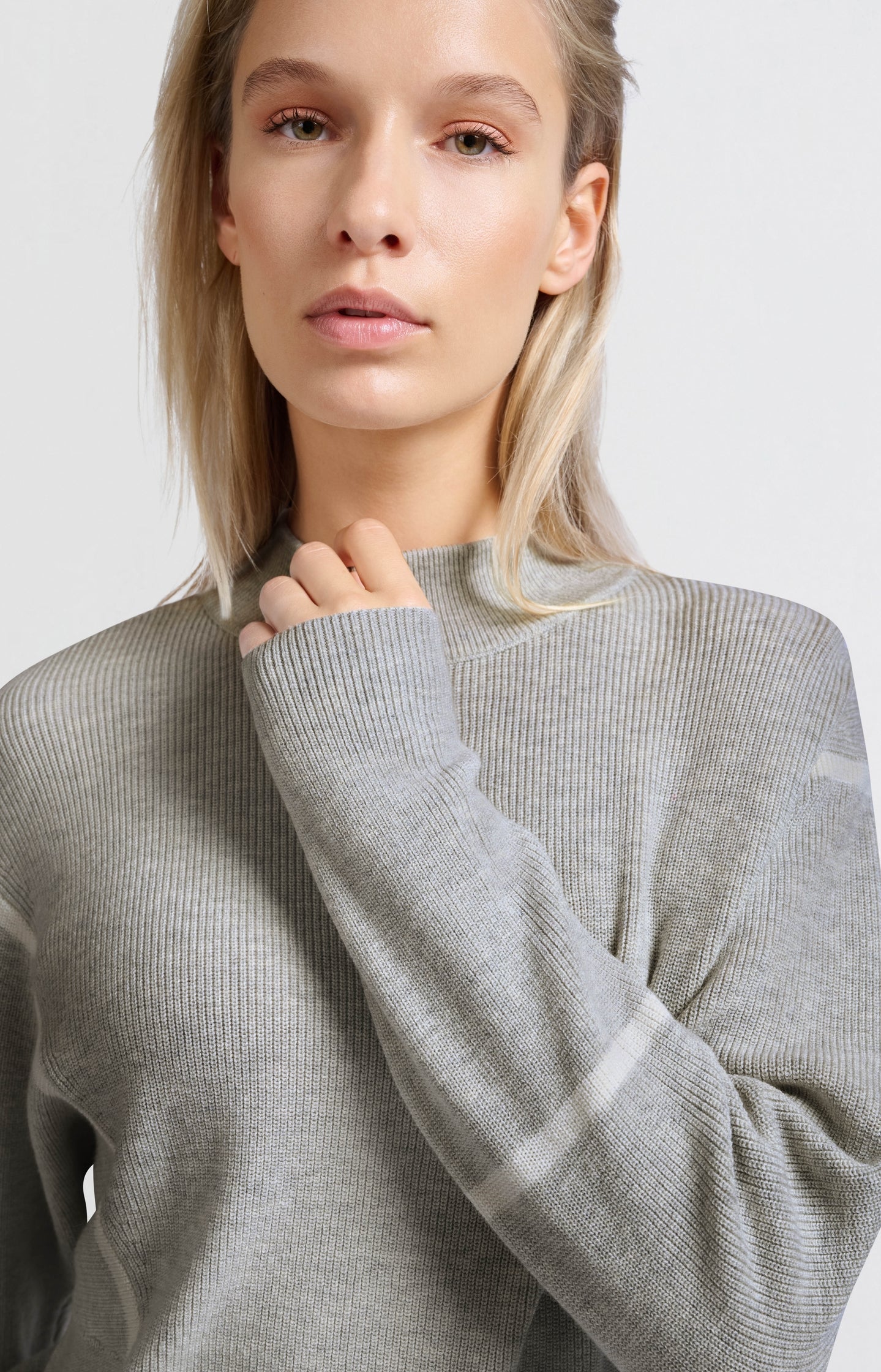 Sweater with high neck and subtle stripe details