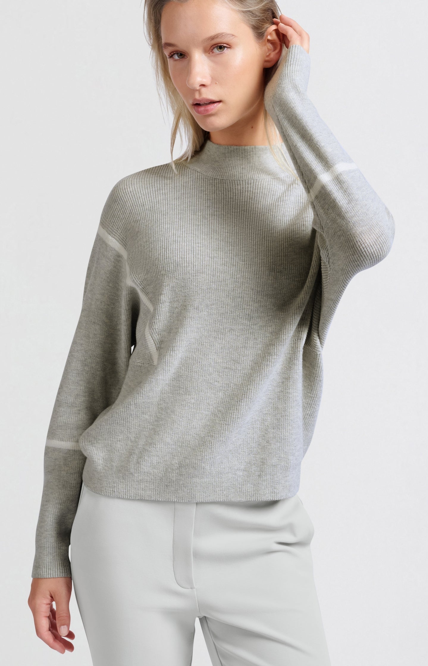 Sweater with high neck and subtle stripe details