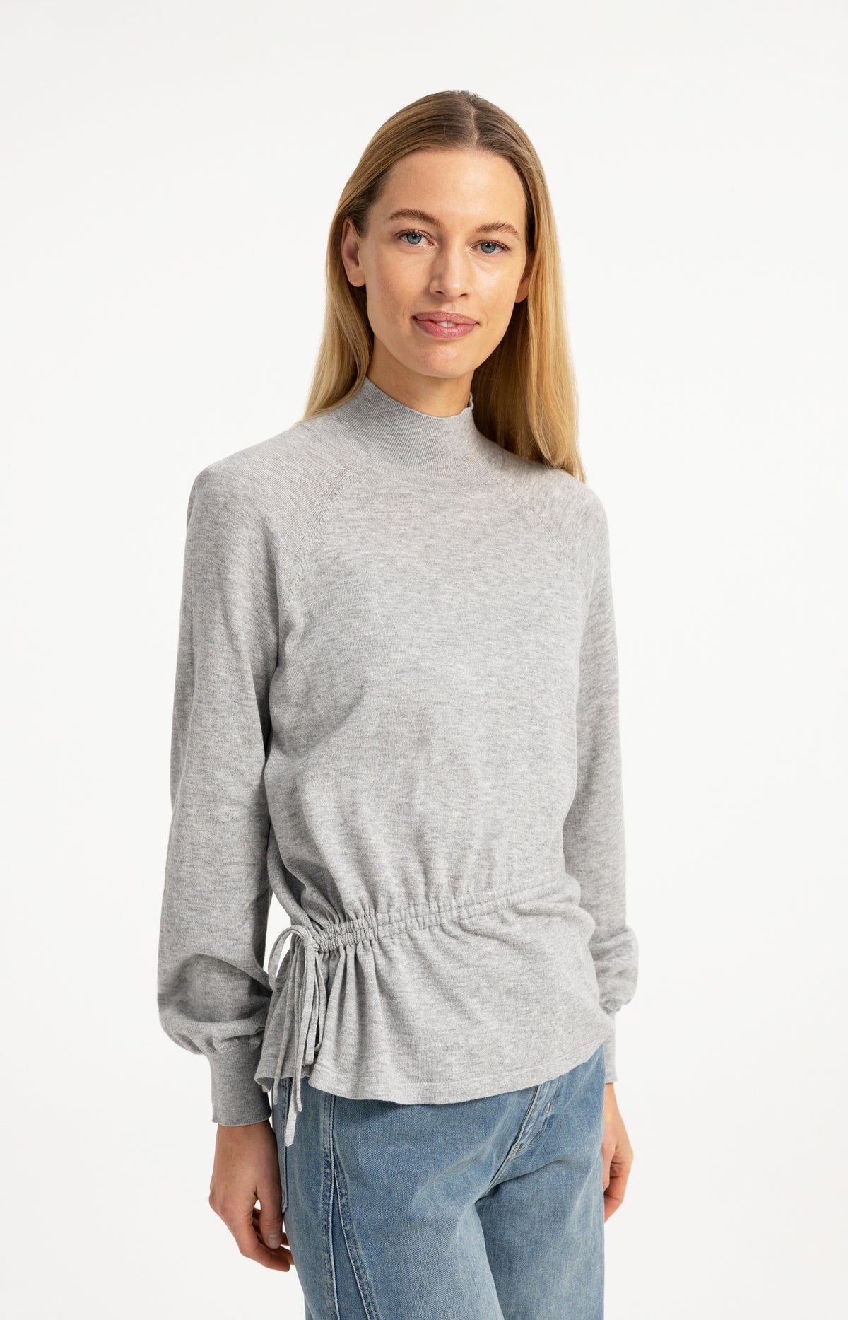 Sweater with high neckline and waist cord