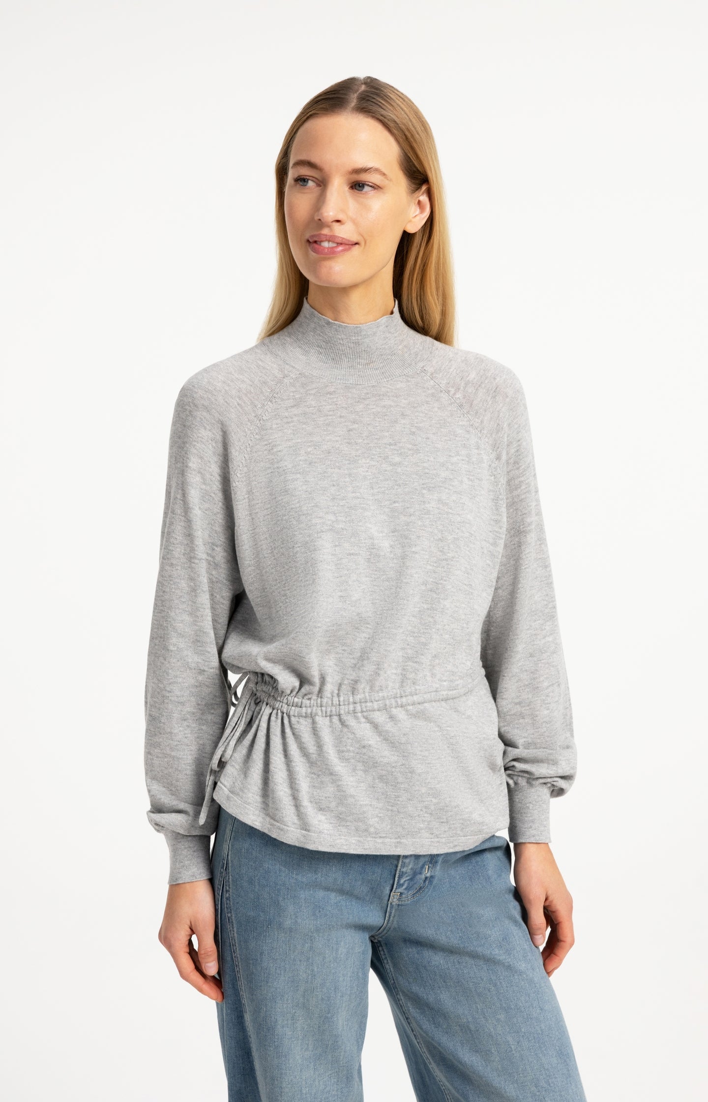 Sweater with high neckline and waist cord