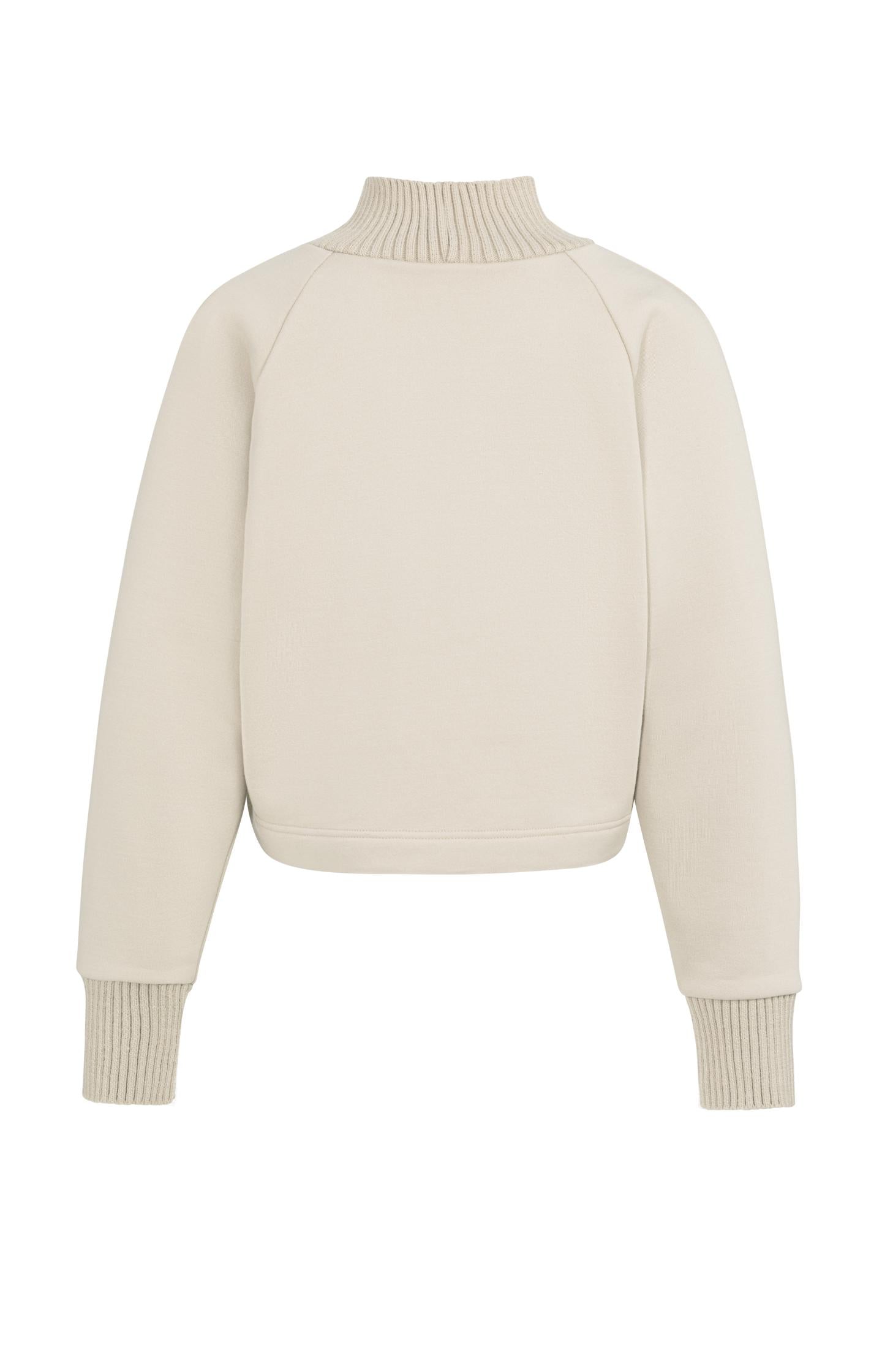 Sweater with knitted collar and subtle stitching