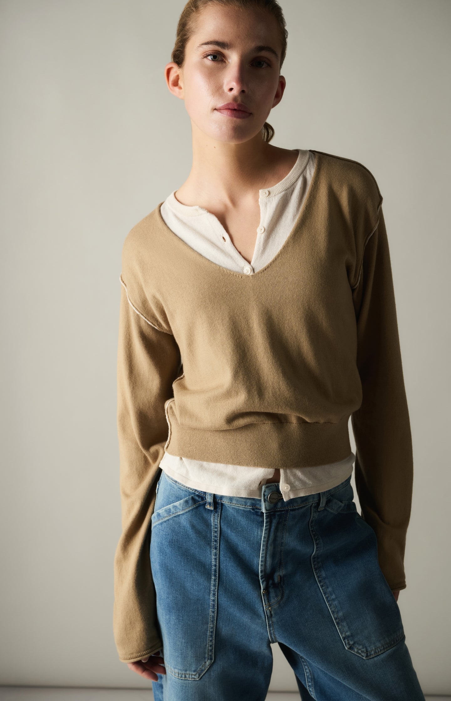 Sweater with layered look and contrast neckline