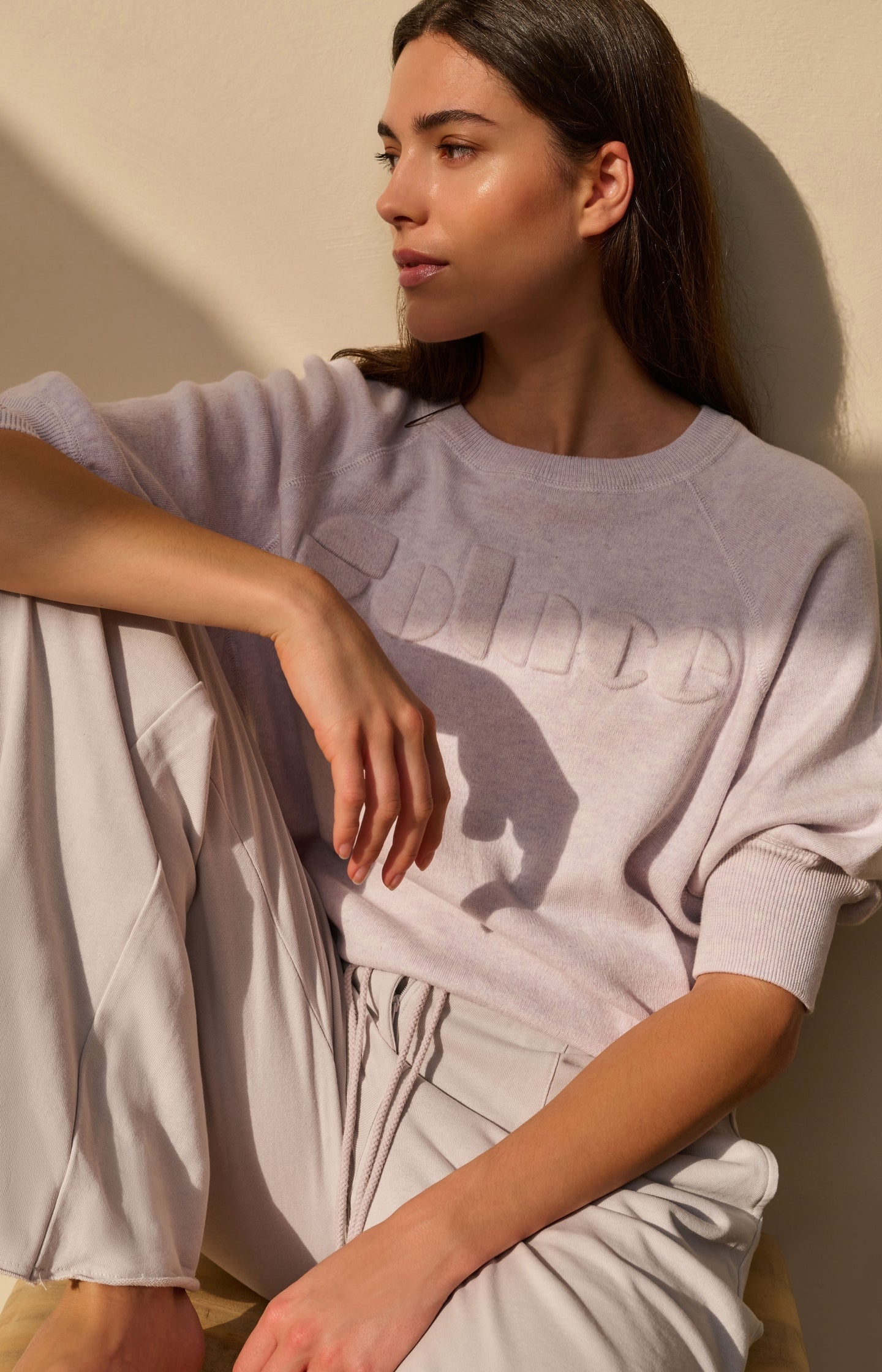 Sweater with raglan sleeves and tonal artwork