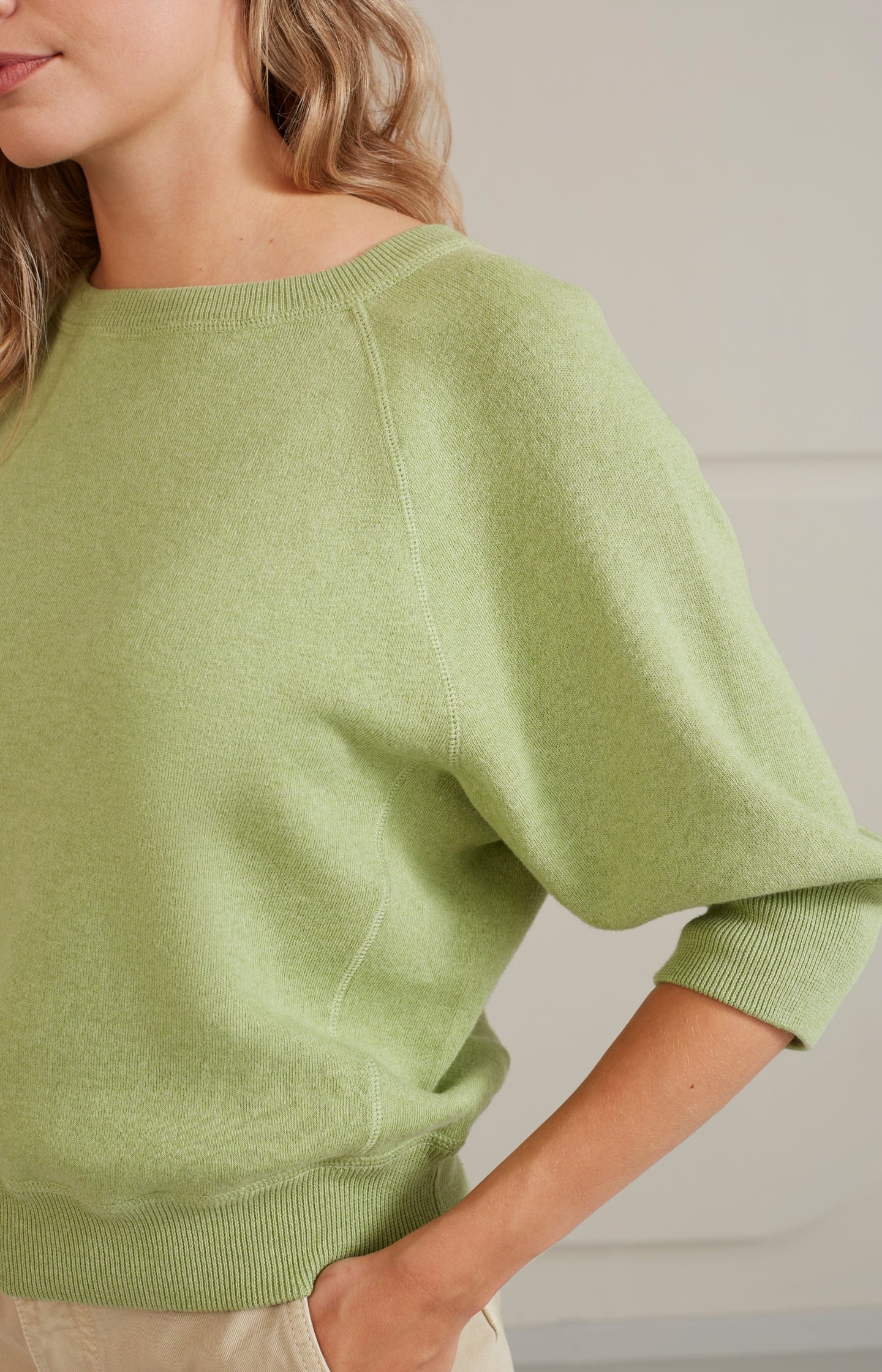 Sweater with round neck and half long raglan sleeves