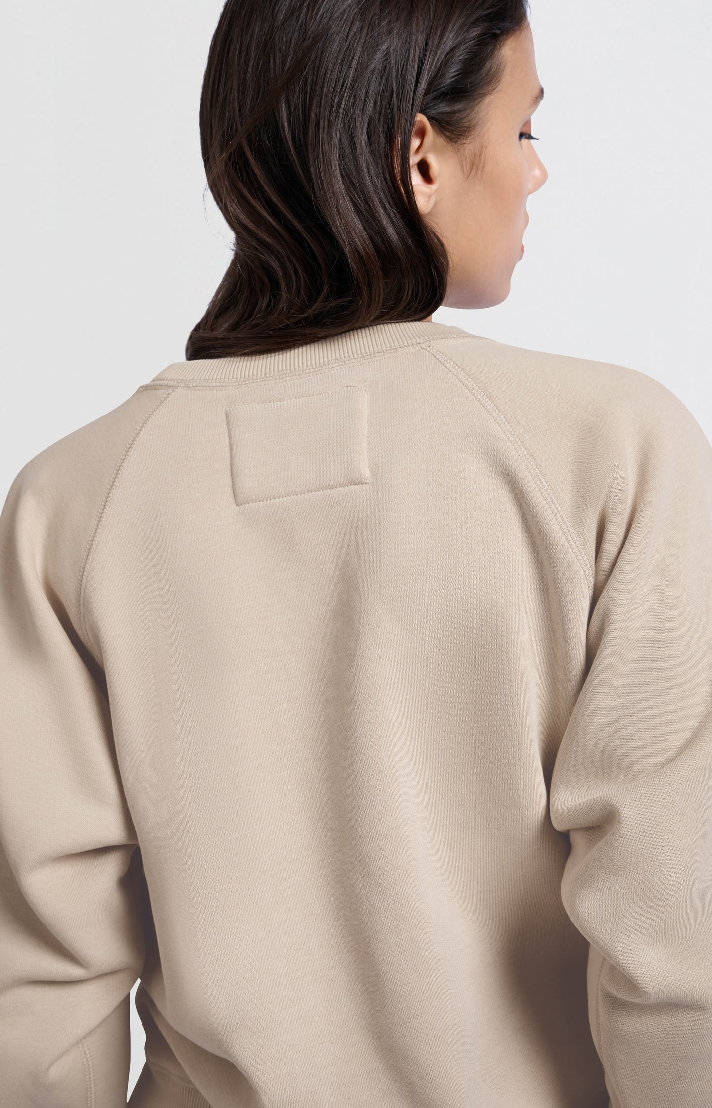 Sweater with round neck and raglan sleeves