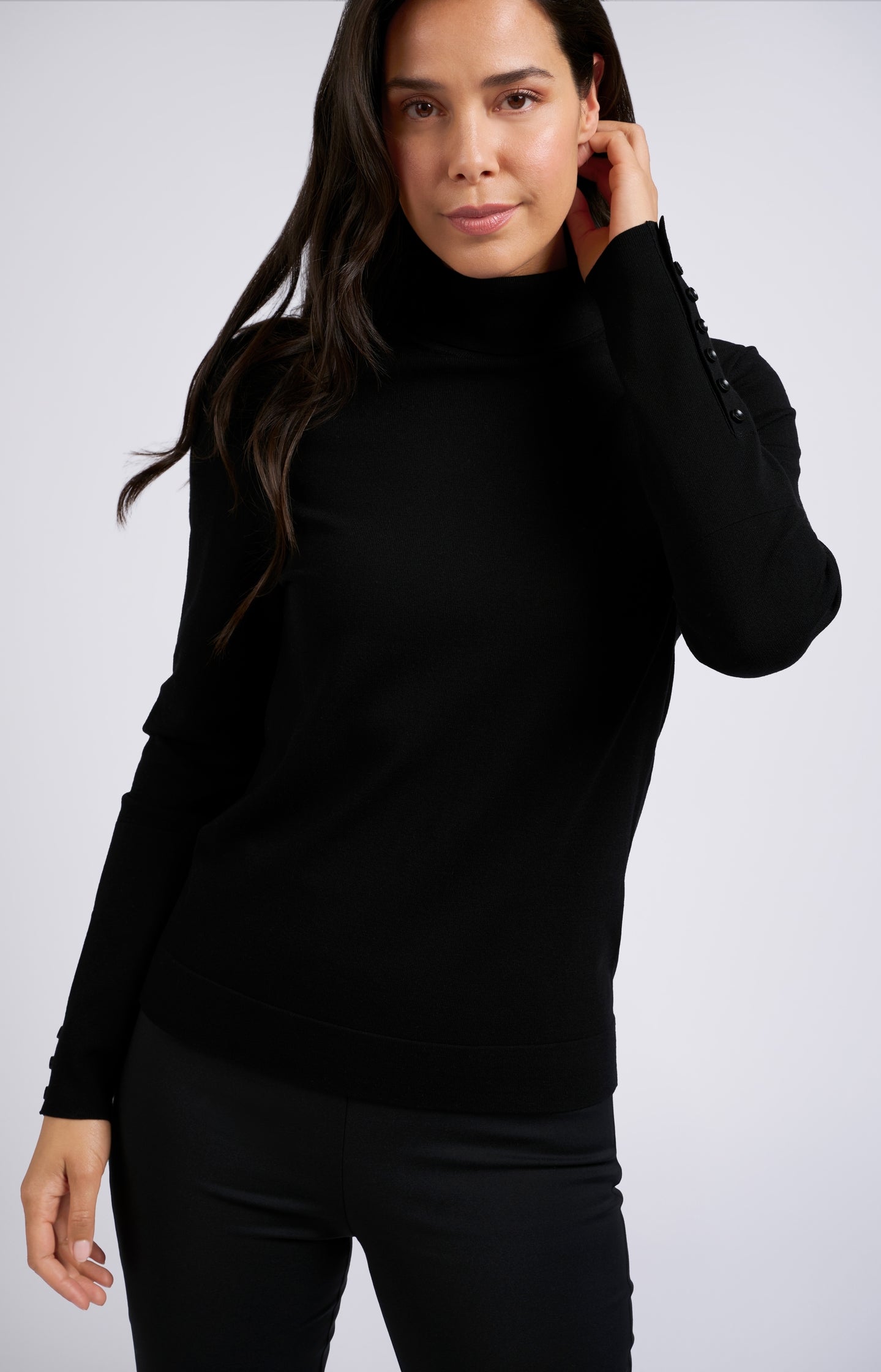 Sweater with turtleneck and long sleeves with buttons