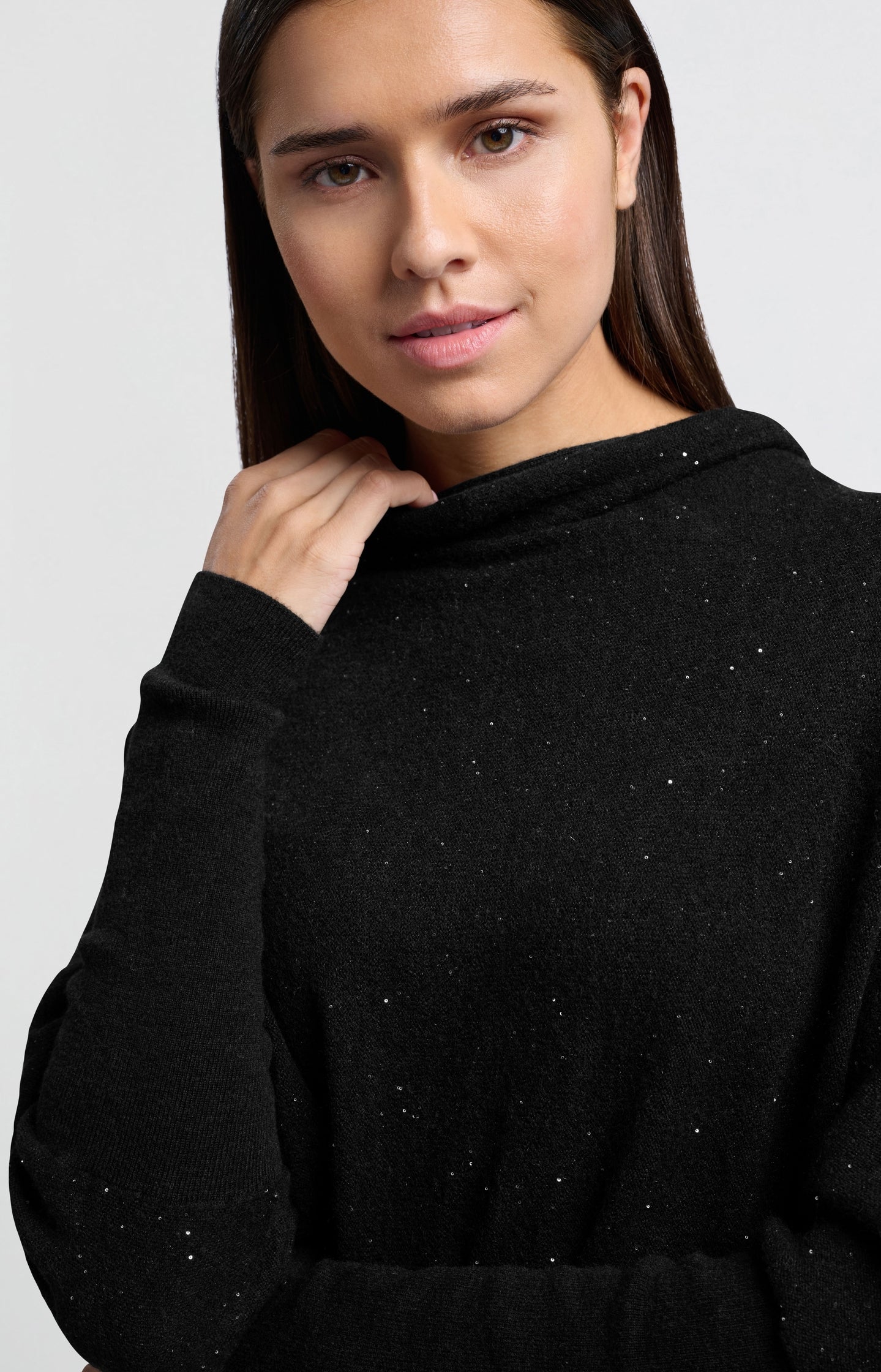 Sweater with turtleneck, batwing sleeves and glitter sequins