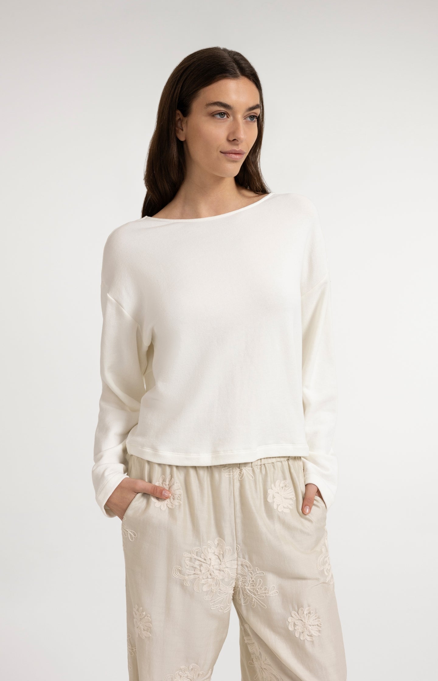 Sweater with V-neck and twisted detail at the back