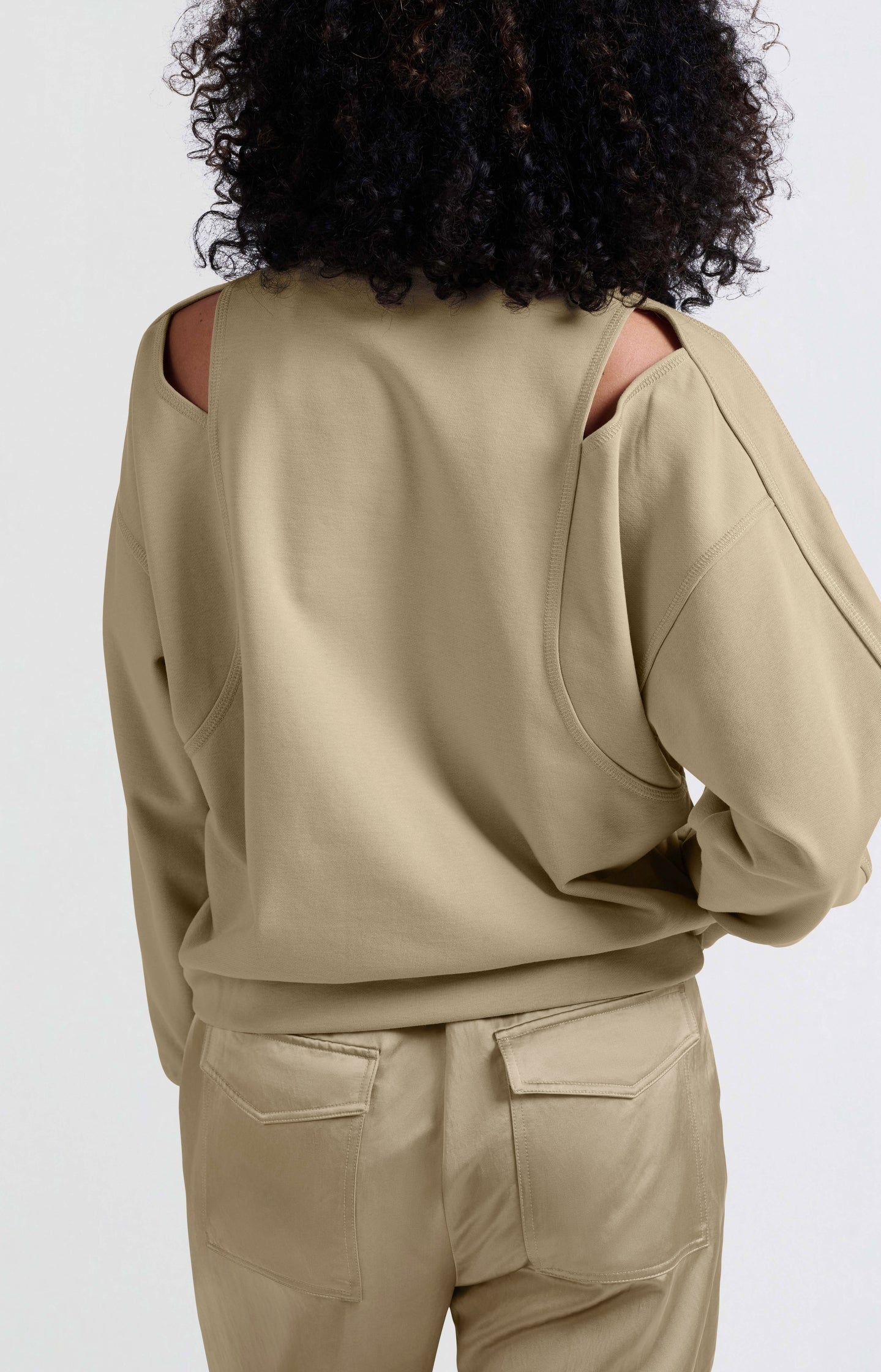 Sweatshirt with open shoulder details and round neckline