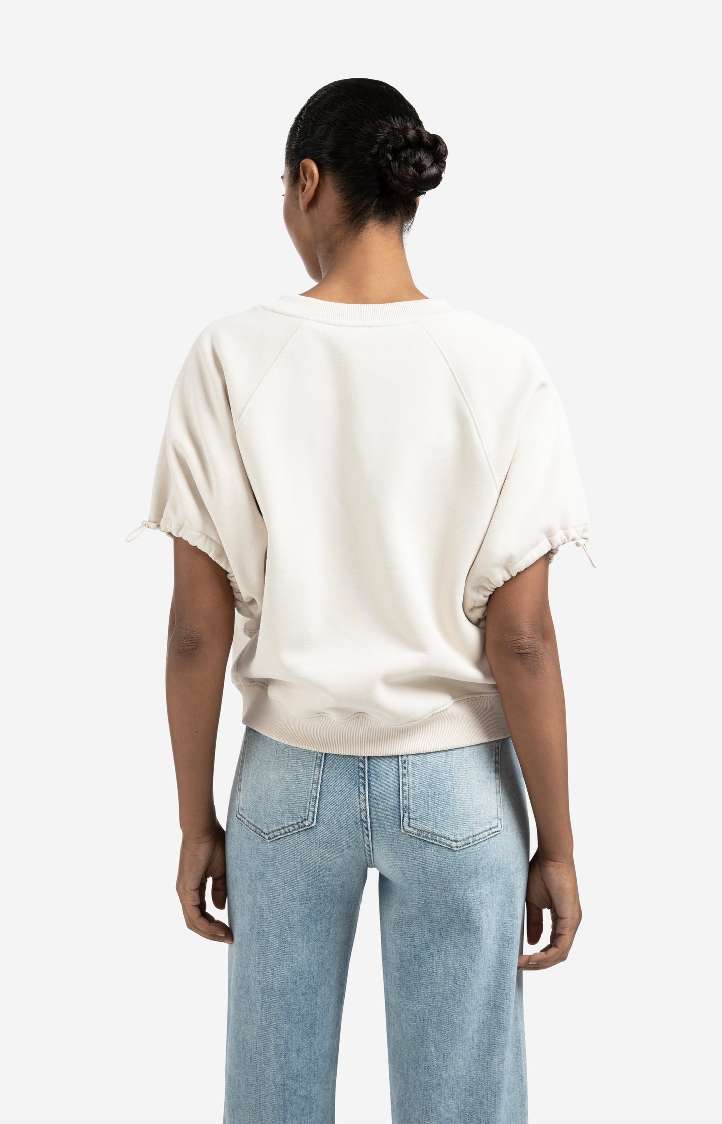 Sweatshirt with V-neck and adjustable sleeve cords