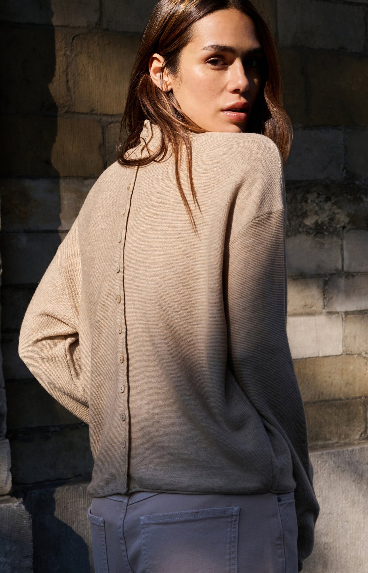 Textured knit sweater with buttoned back