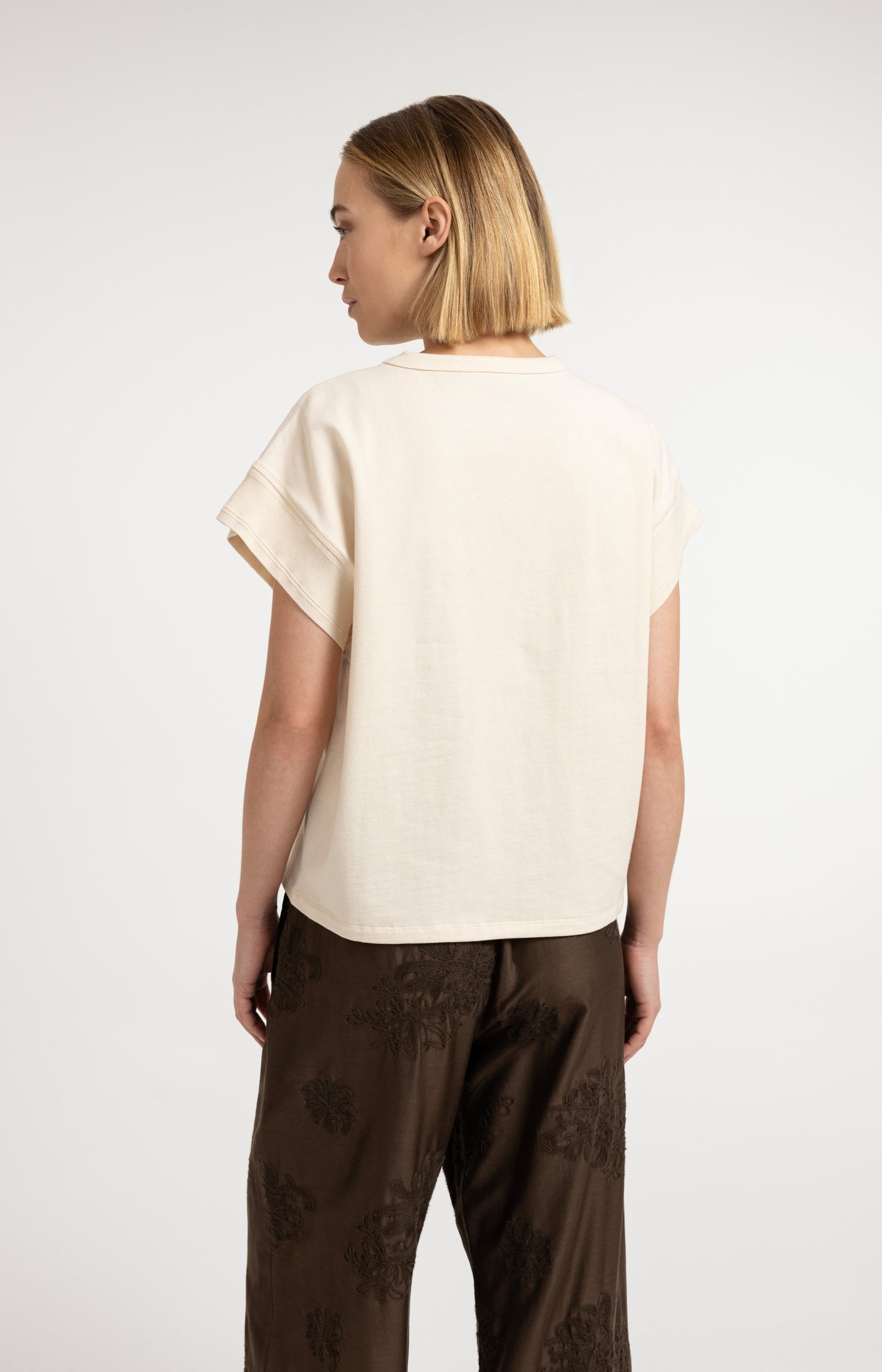 Top with decorative cuffs