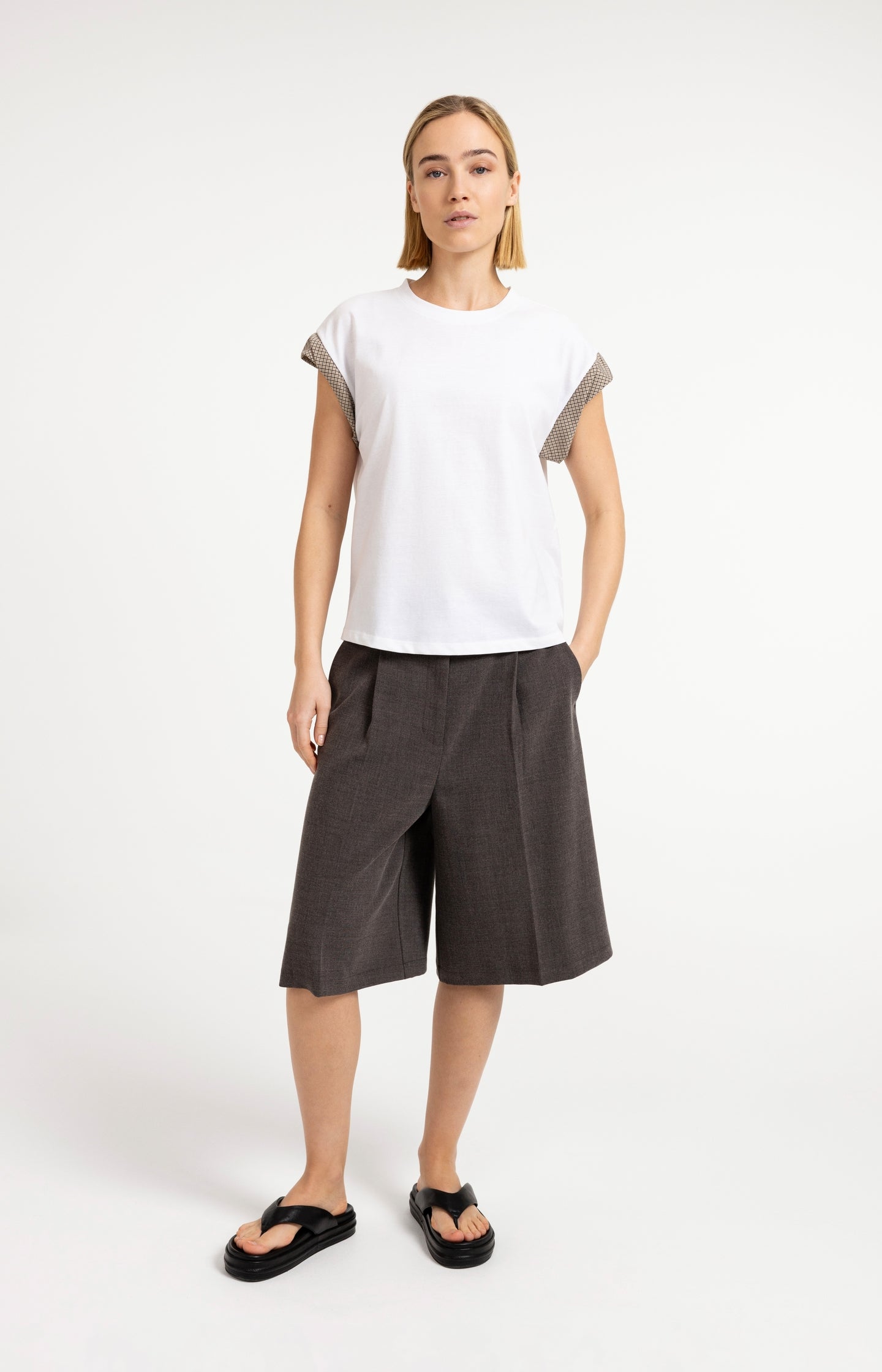 Top with woven cuff details