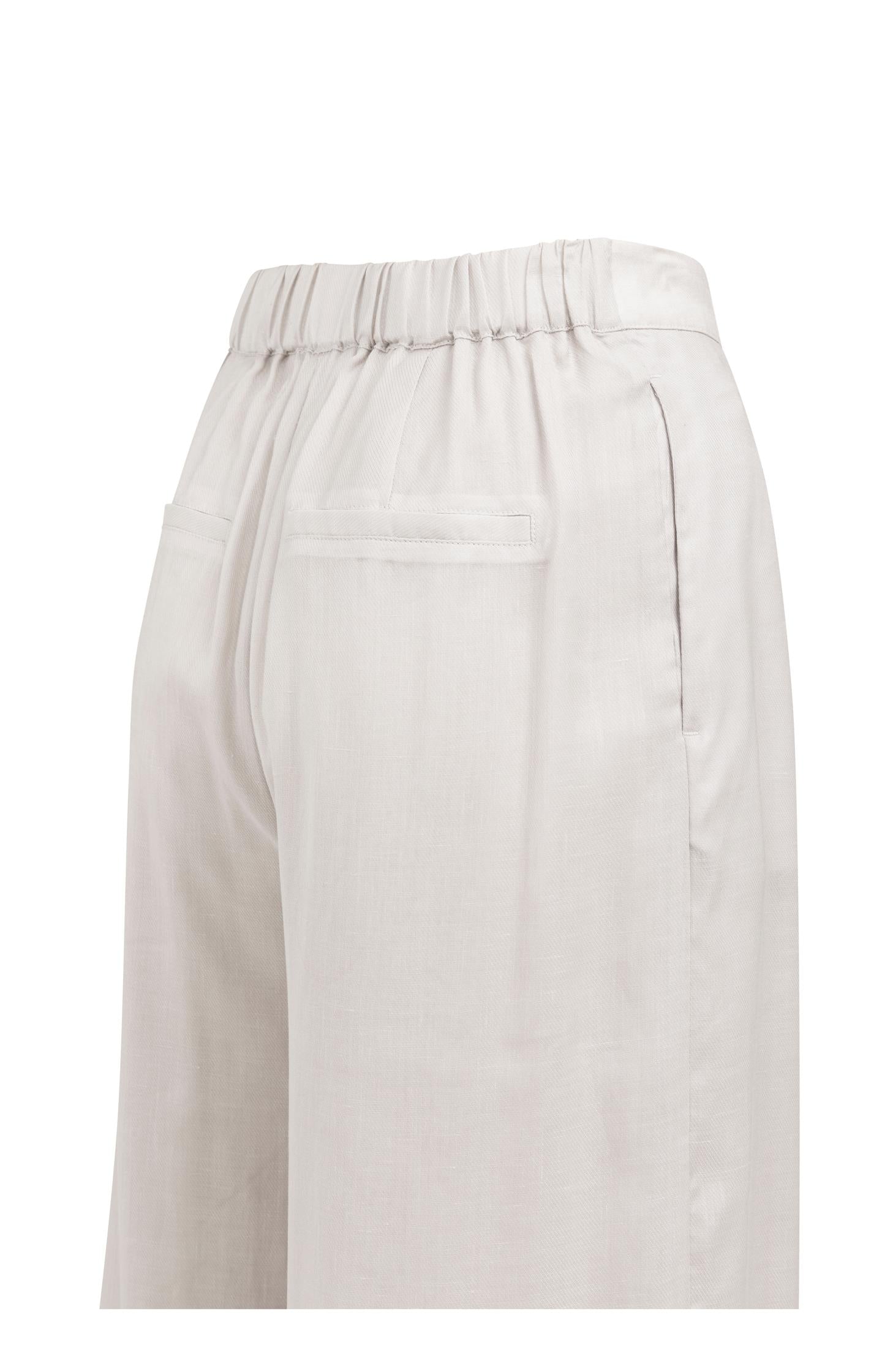 Trousers with wide legs and half elastic waist
