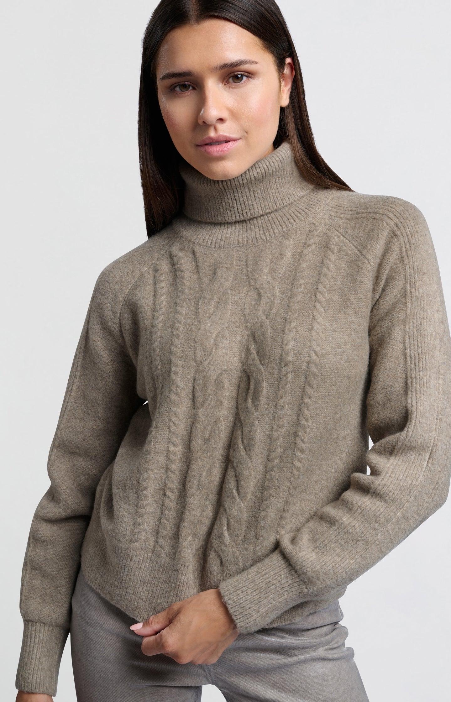 Turtleneck sweater with cable pattern and long sleeves