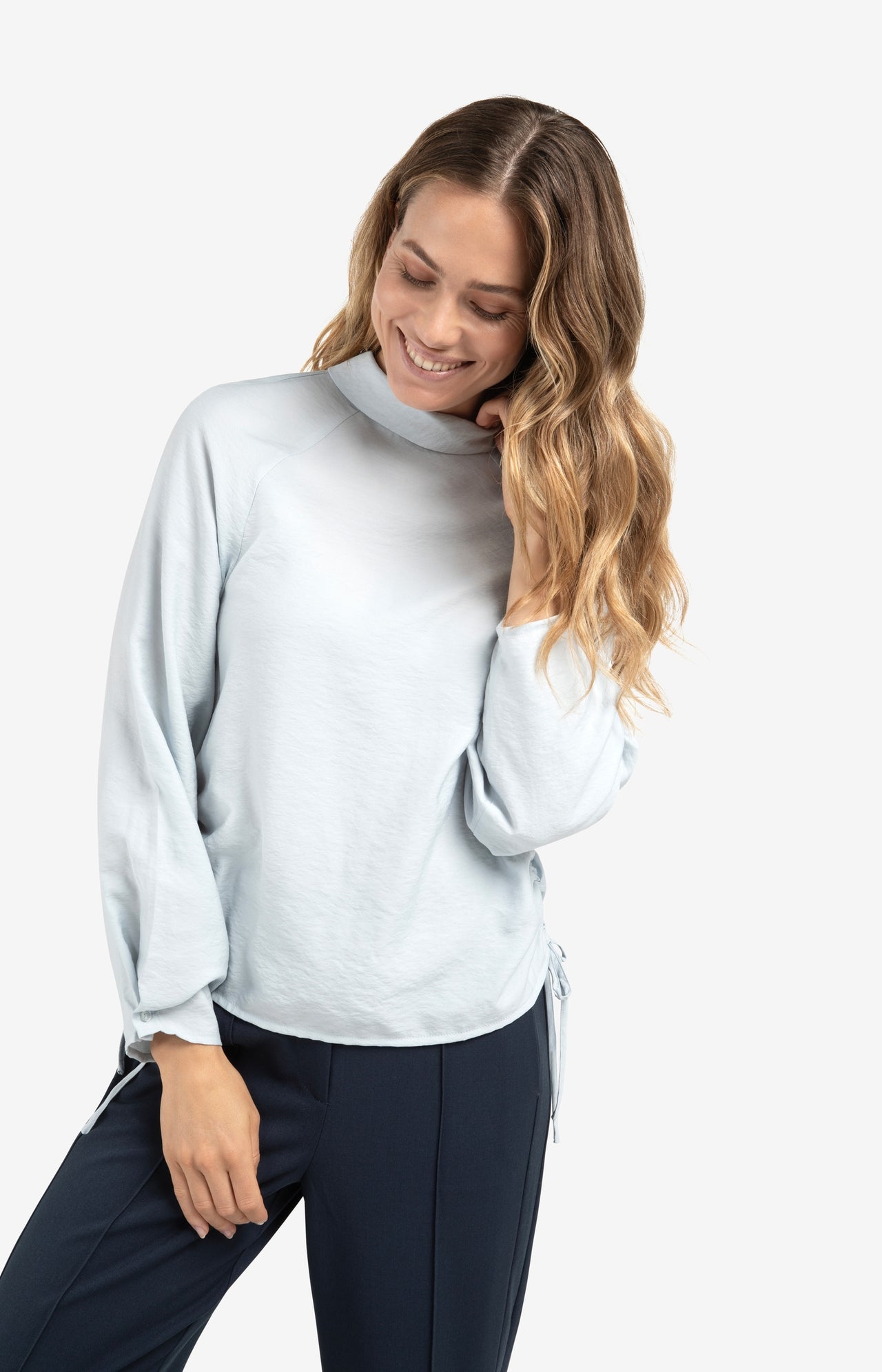 Turtleneck top with side drawstrings and long sleeves