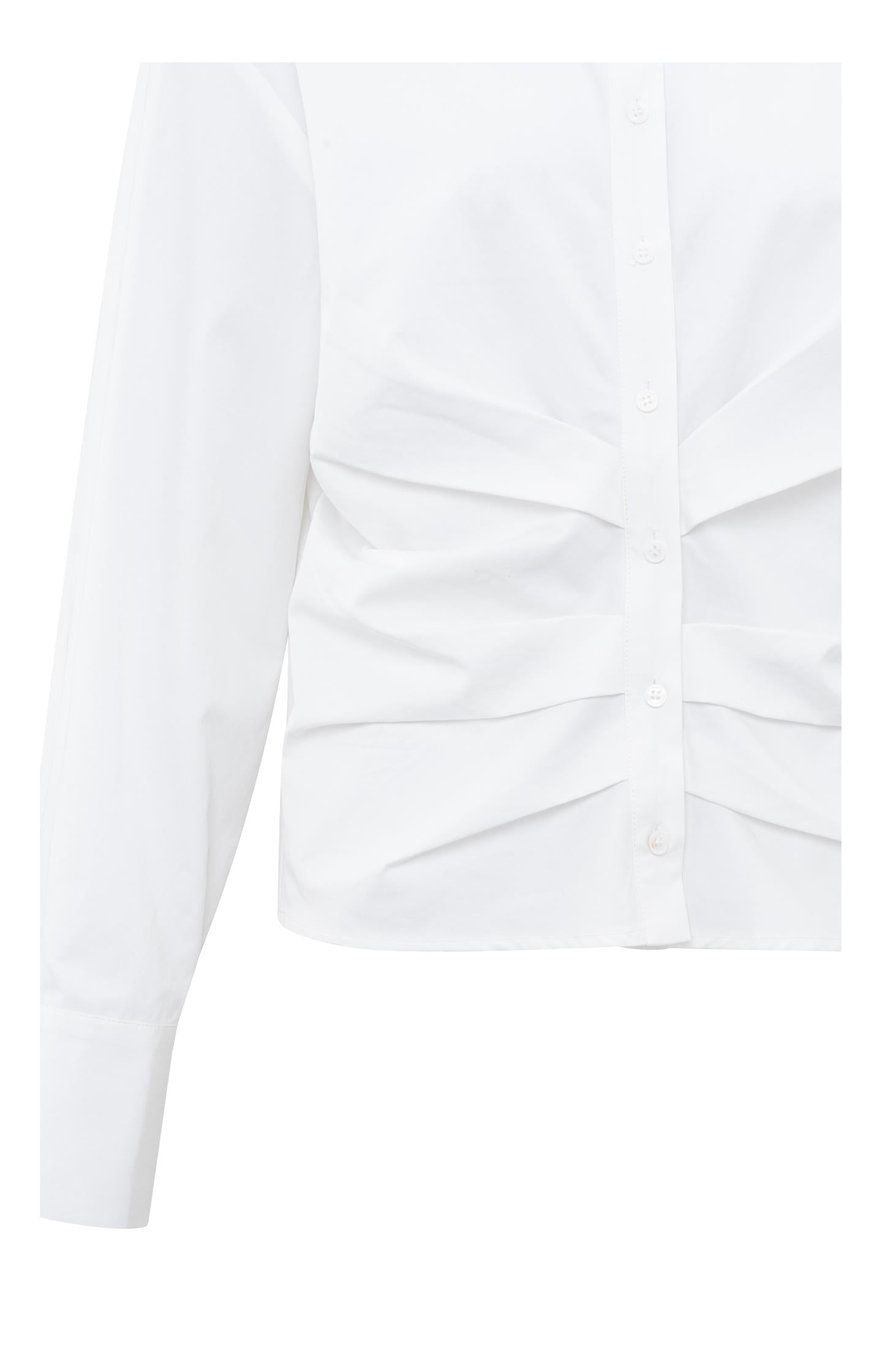 White blouse with long sleeves and a classic collar