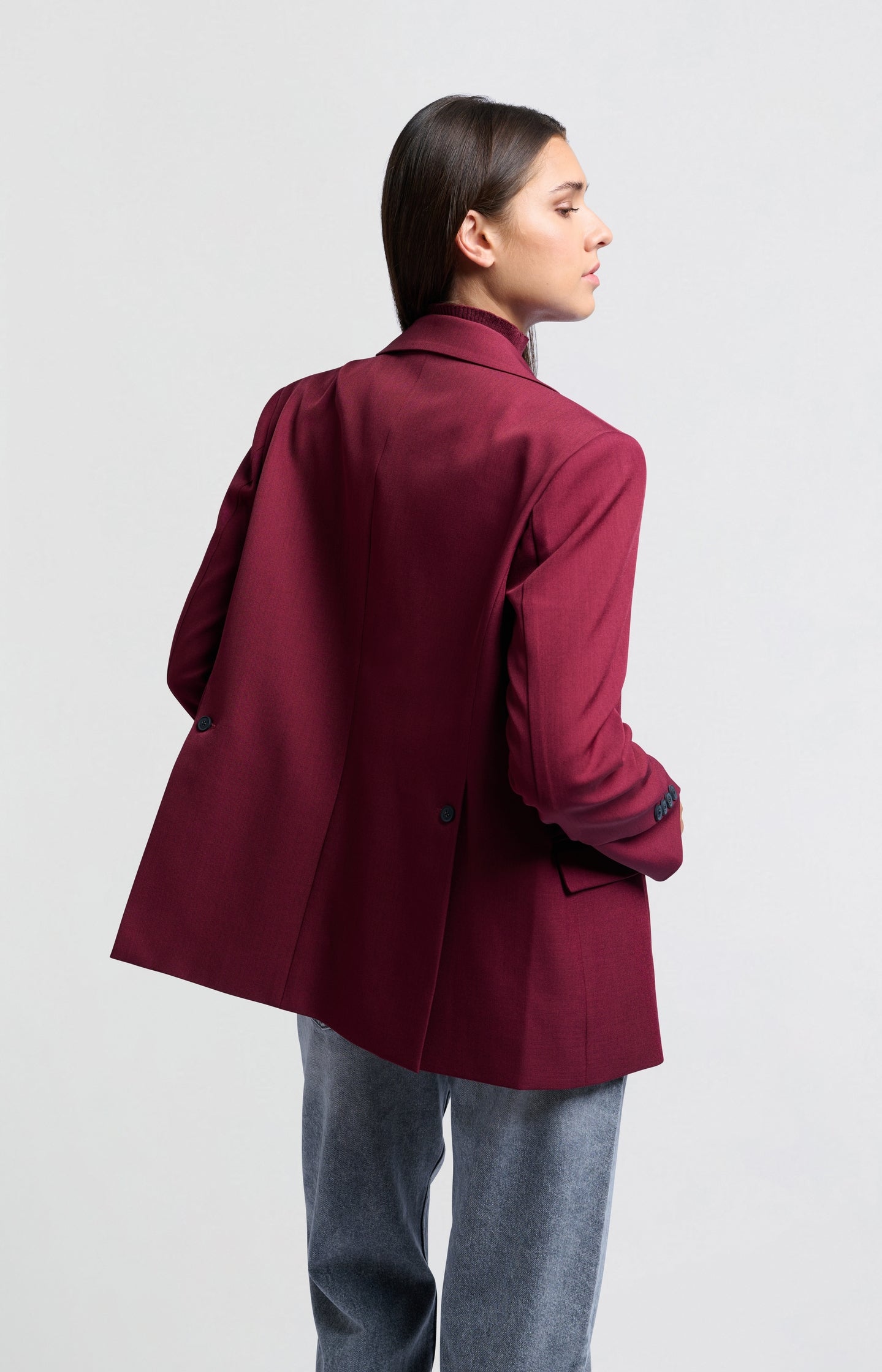 Woven blazer with pockets and button details on sleeves