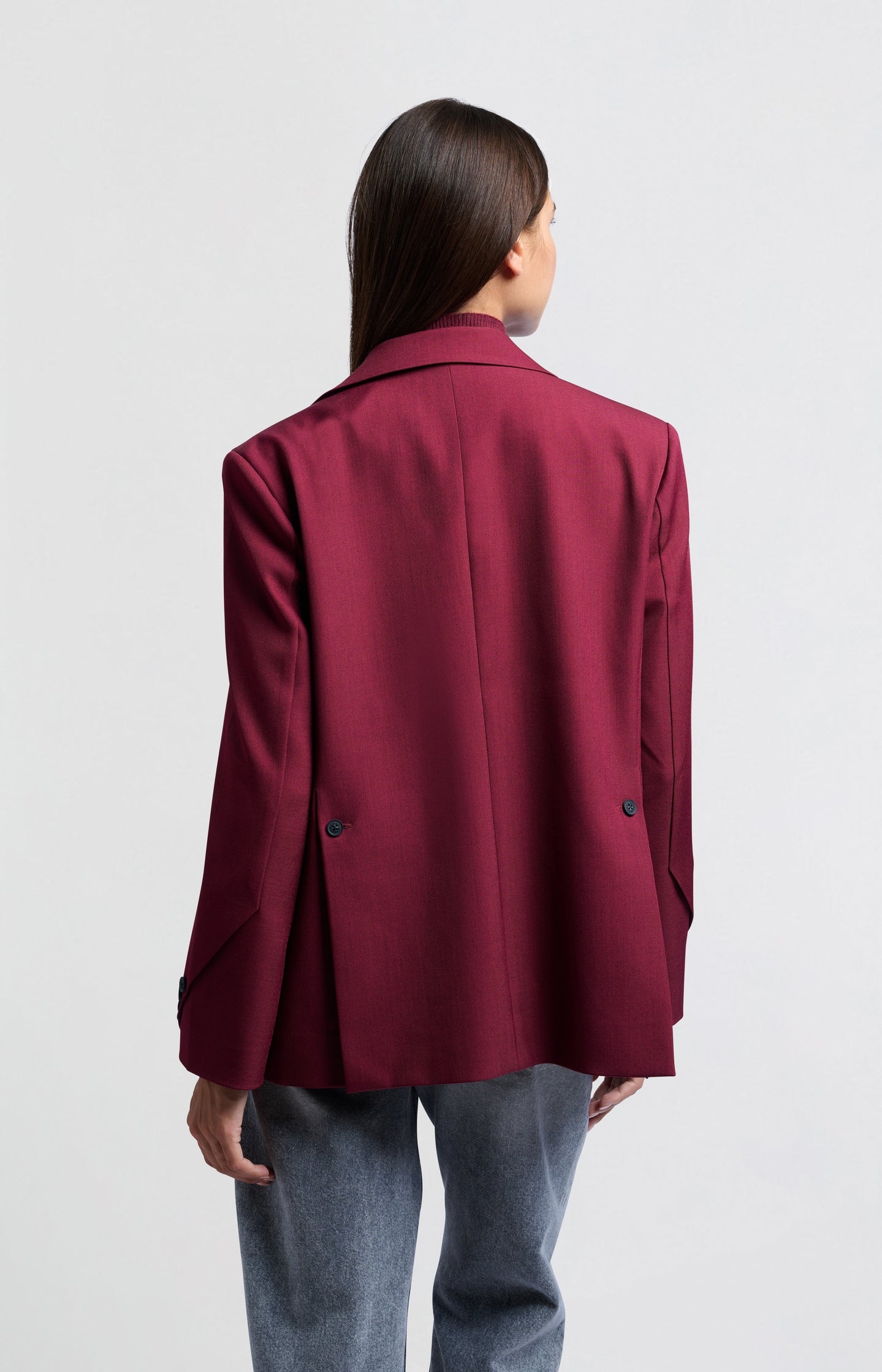 Woven blazer with pockets and button details on sleeves