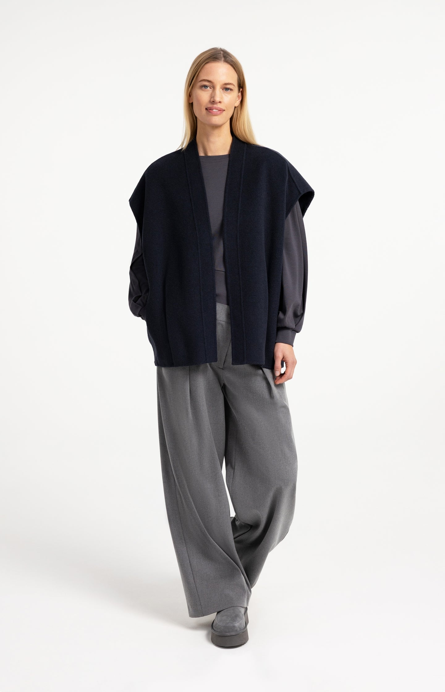 Woven trousers with wide legs and asymmetrical closure