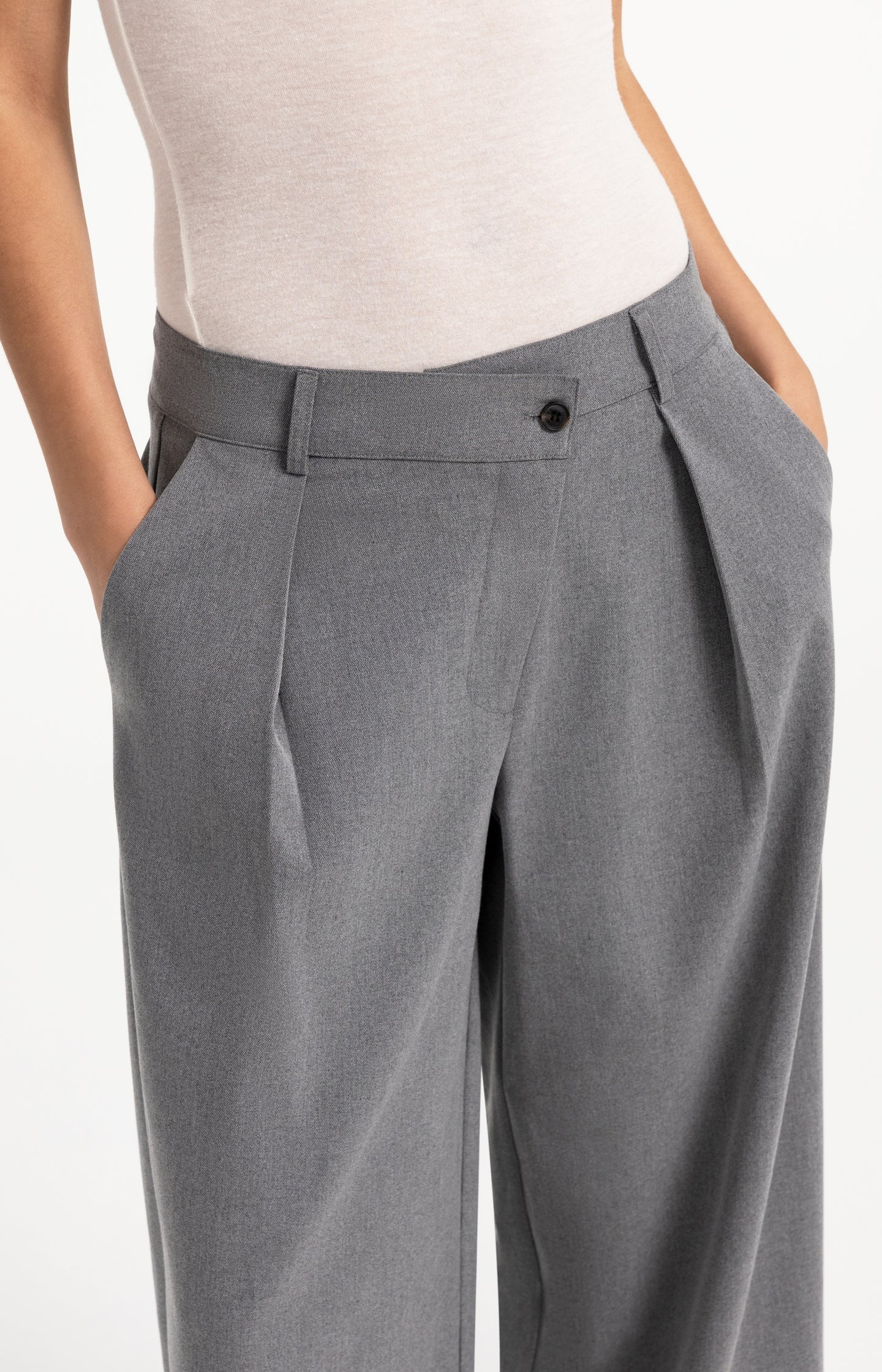 Woven trousers with wide legs and asymmetrical closure