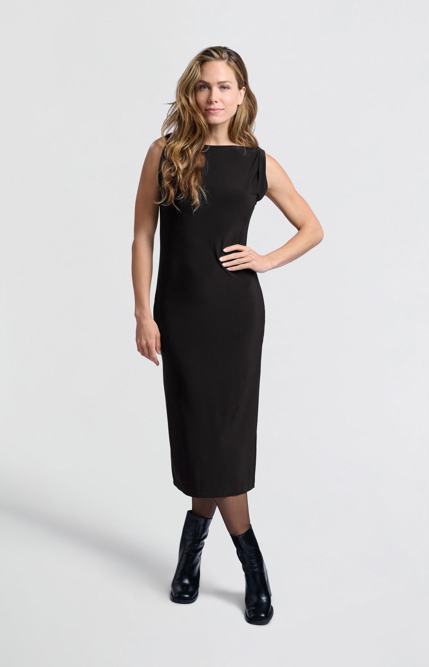 Black dress with twisted shoulder detail and side slit