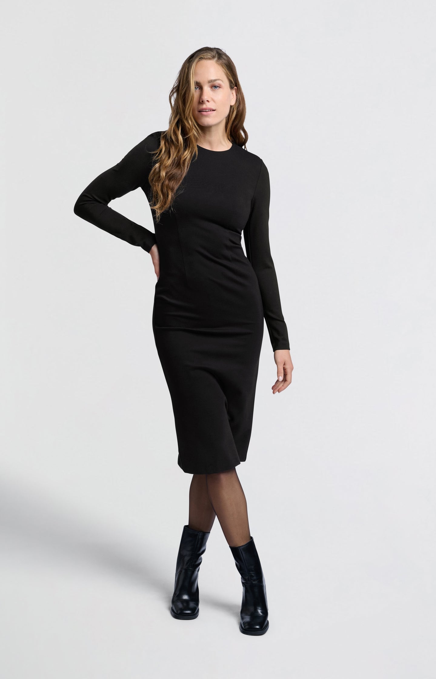 Black midi dress with round neckline and long sleeves