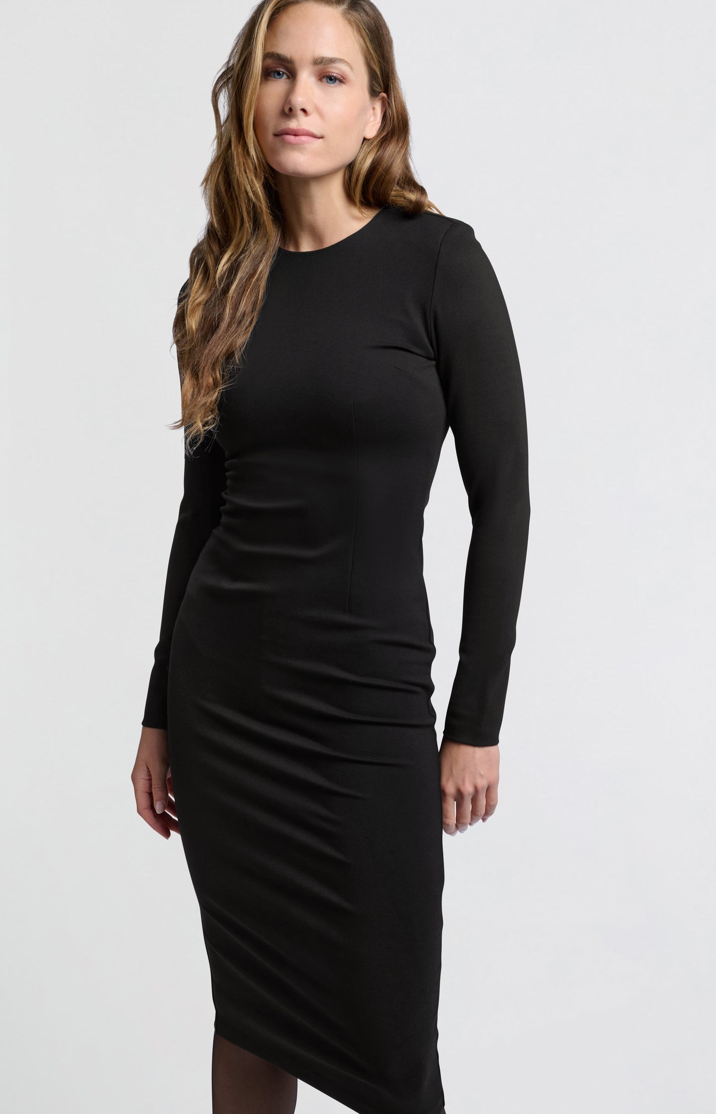 Black midi dress with round neckline and long sleeves